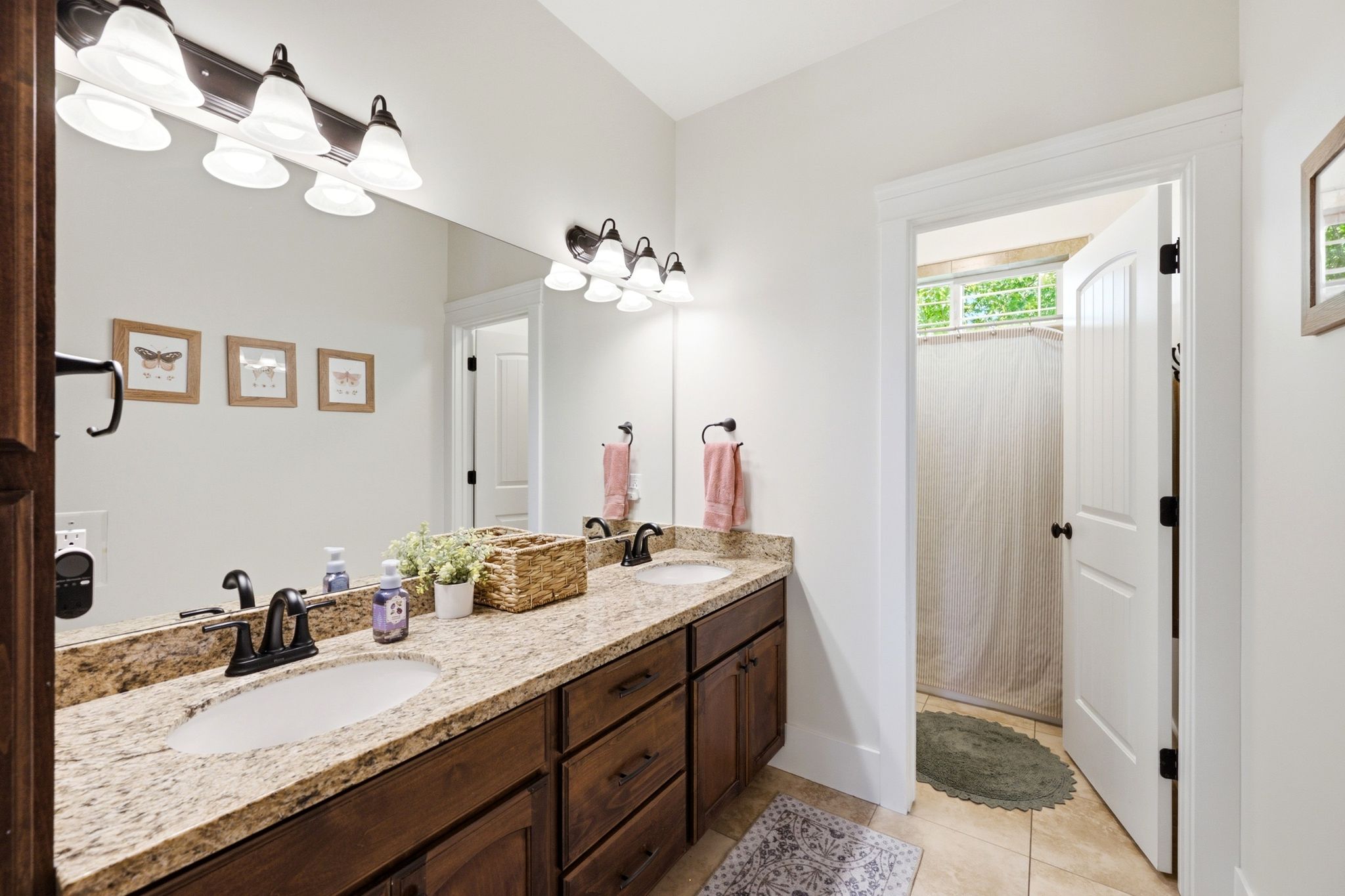 Dual vanity with granite countertop and integrated sinks
