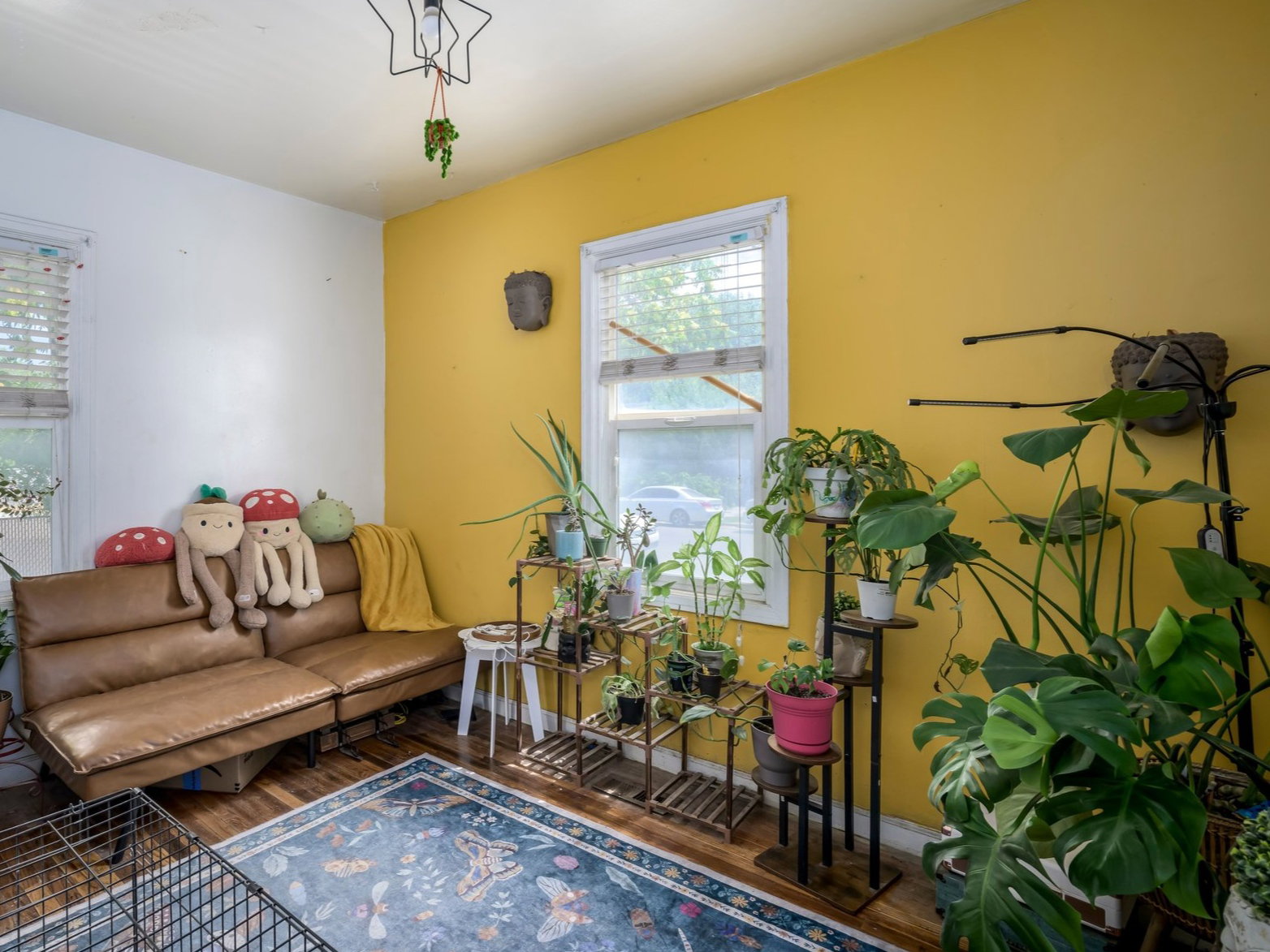 White walls with a single accent wall in a vibrant yellow hue