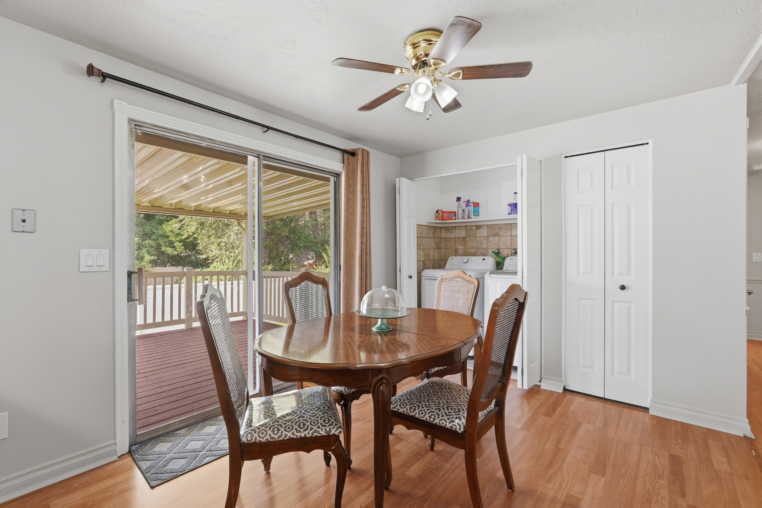 Sliding glass doors opening to an exterior deck