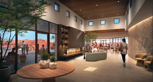 Spacious communal lounge featuring a contemporary linear fireplace, wood-finish ceiling, large format glass paneling, and an exposed aggregate floor