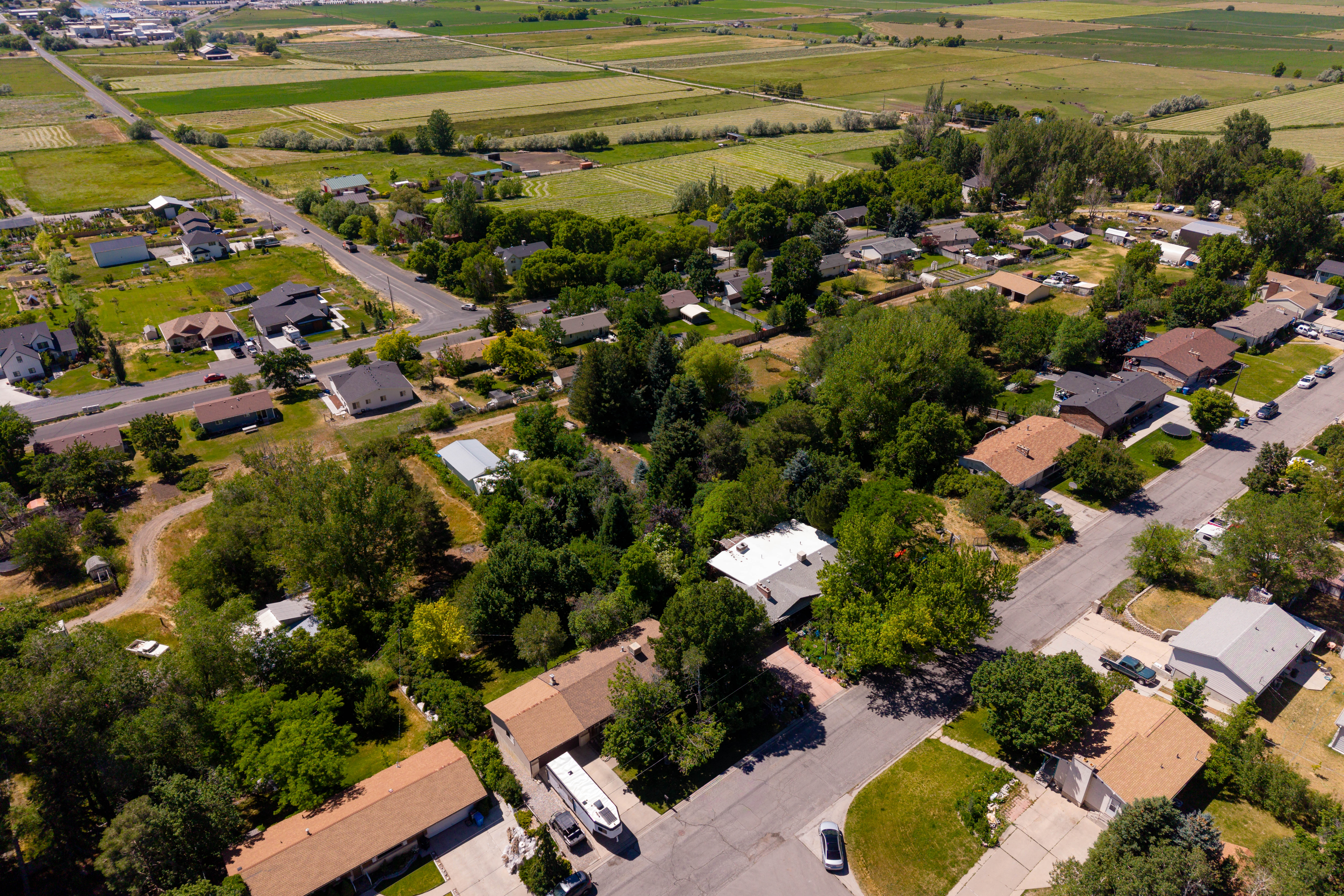 Aerial perspective showcasing a residential area with varied housing styles