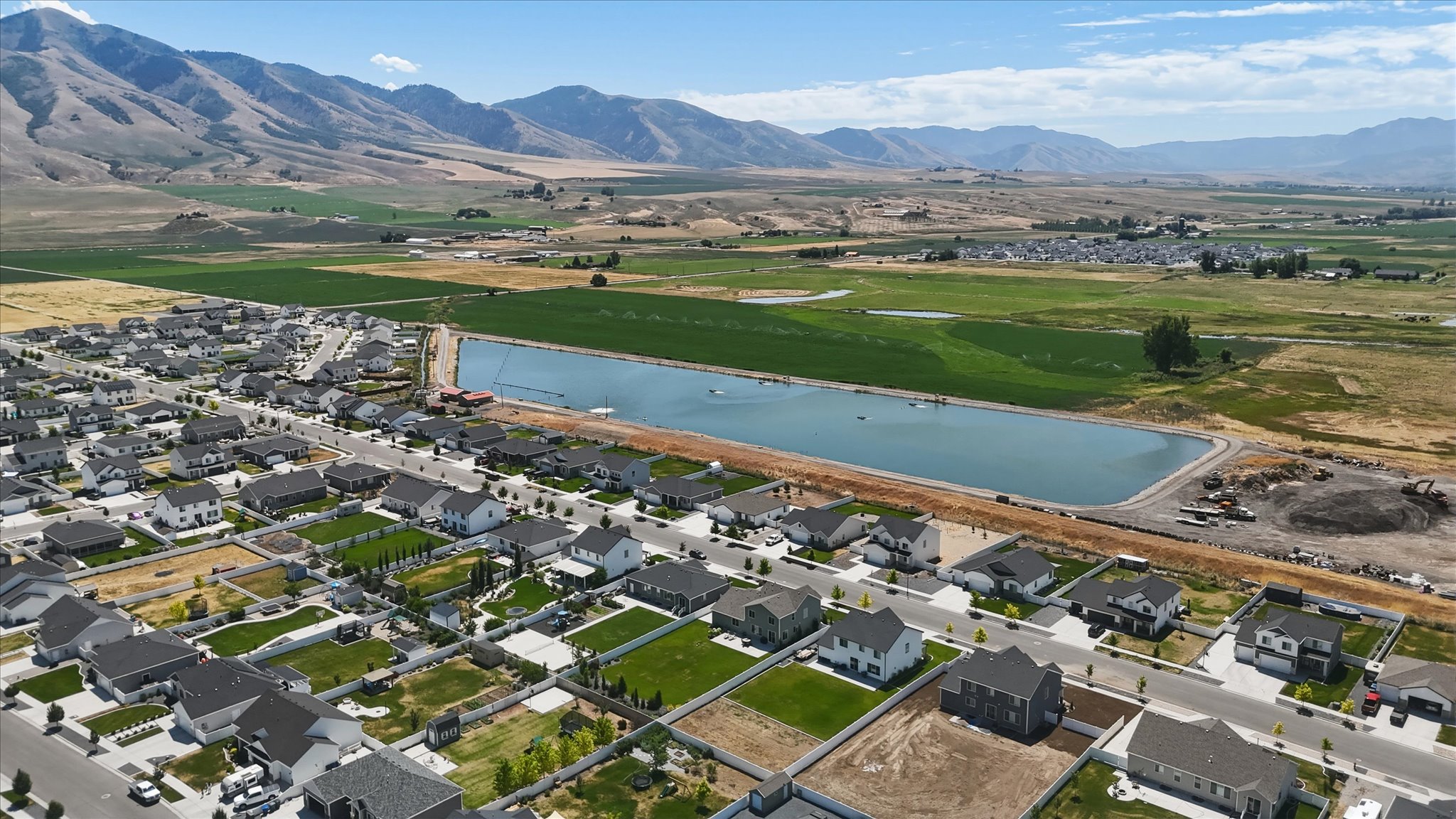 Aerial perspective showcasing a residential development with structured street layouts and individual properties