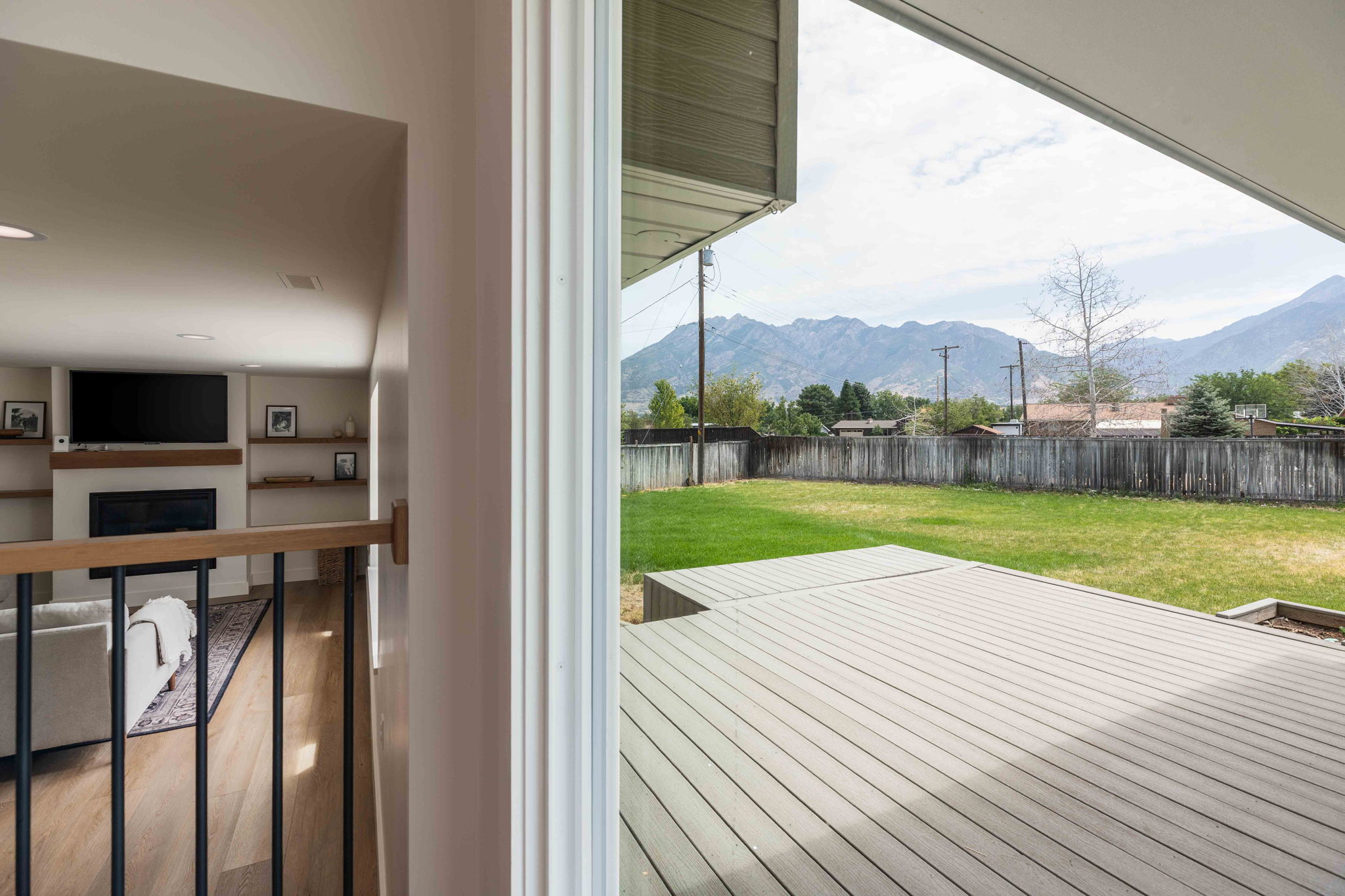 Expansive outdoor deck with mountain scenery