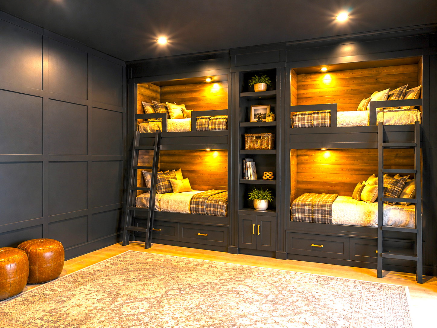 Custom built-in bunk beds with integrated shelving and storage drawers