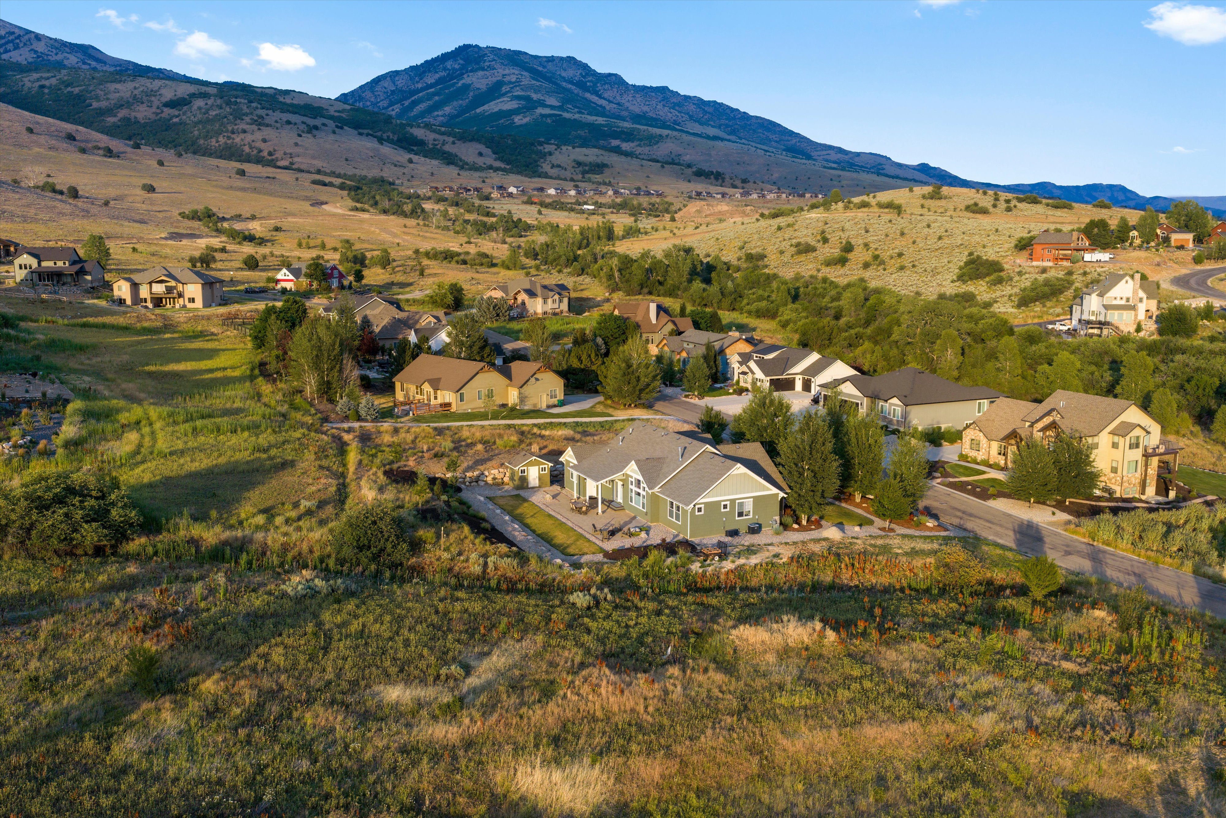 Expansive residential development nestled within a mountainous landscape