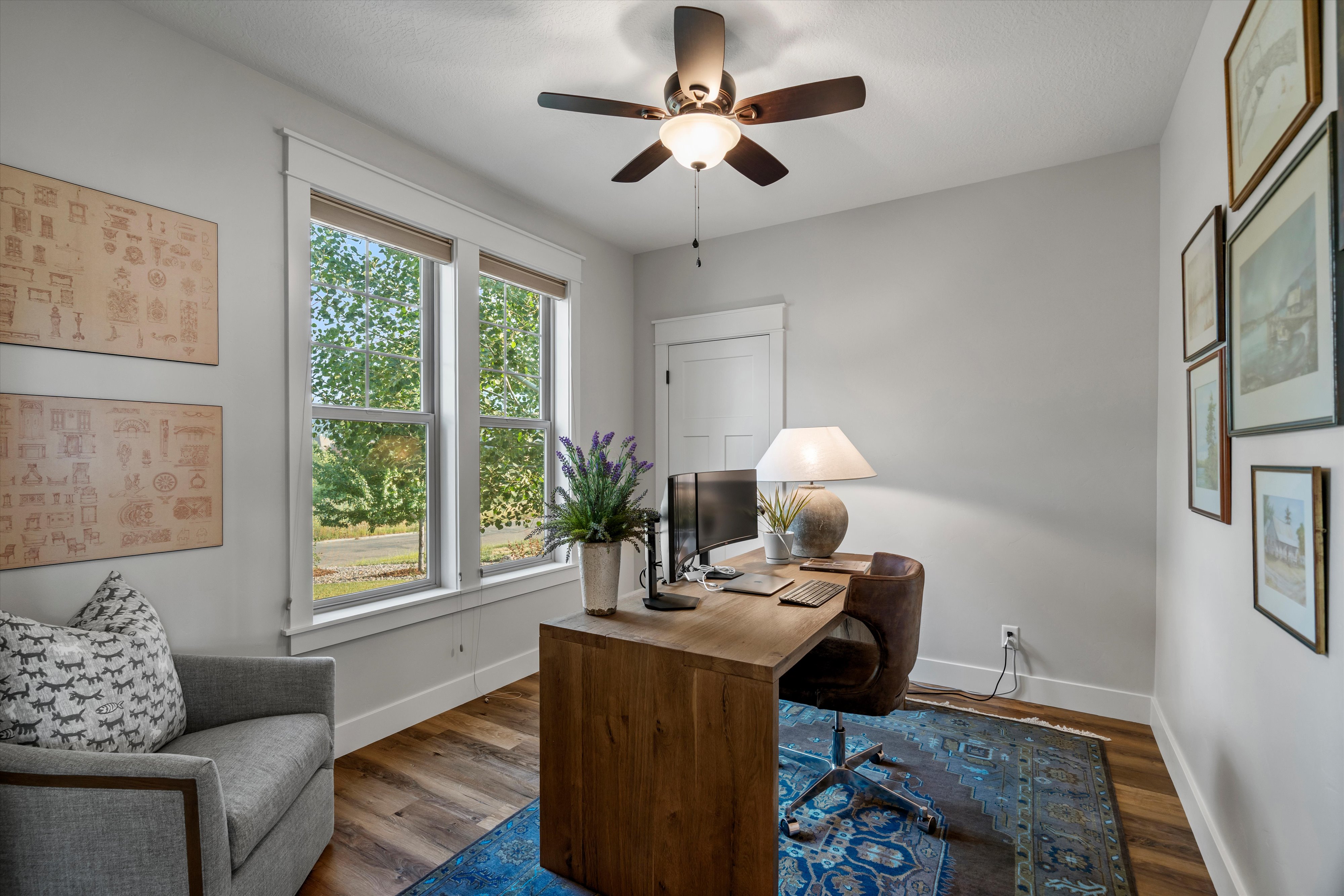 Interior room featuring wood-finish flooring and light-toned walls