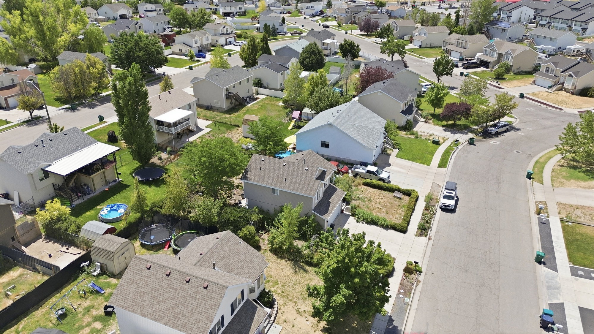 Residential neighborhood showcasing various architectural styles and mature trees
