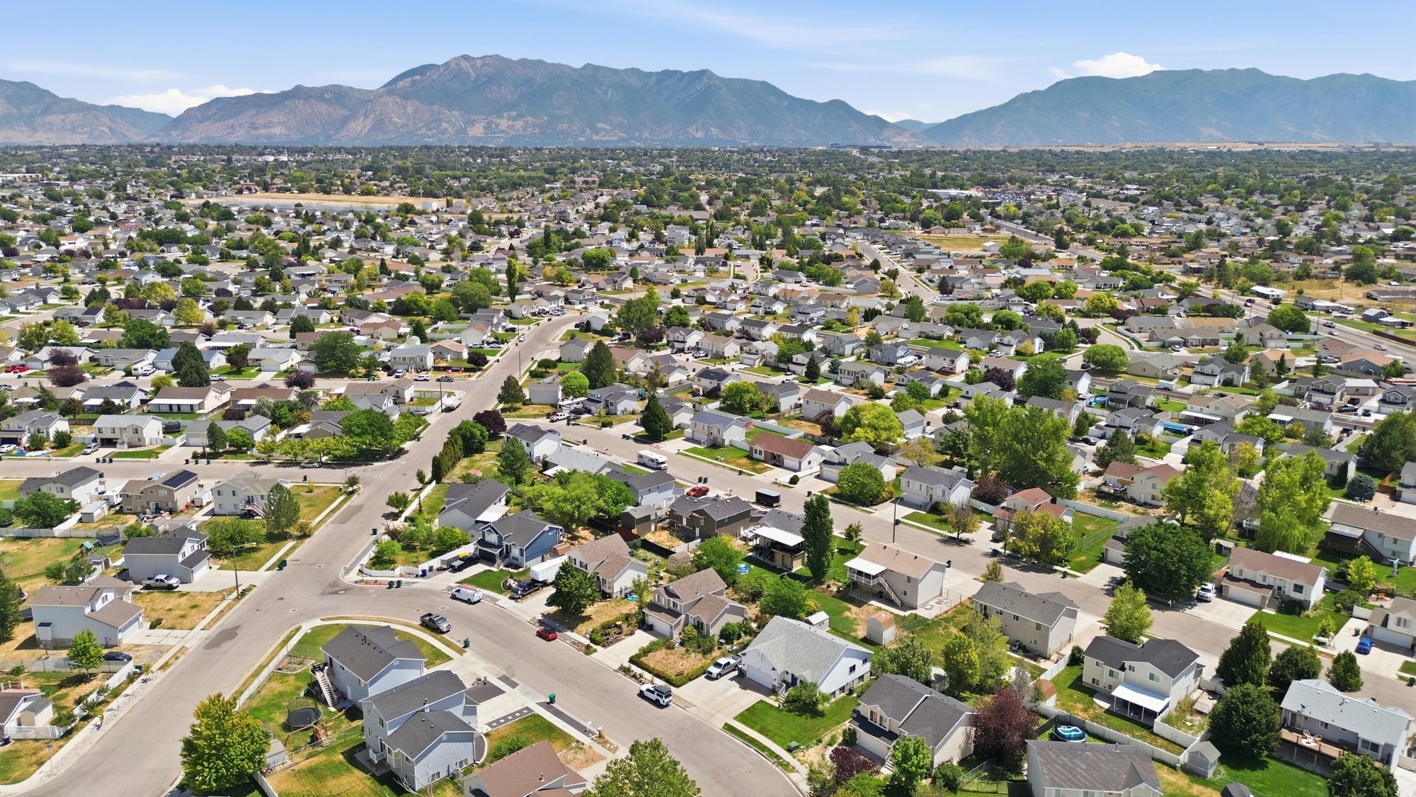 Aerial perspective showcasing a residential area with varied housing styles