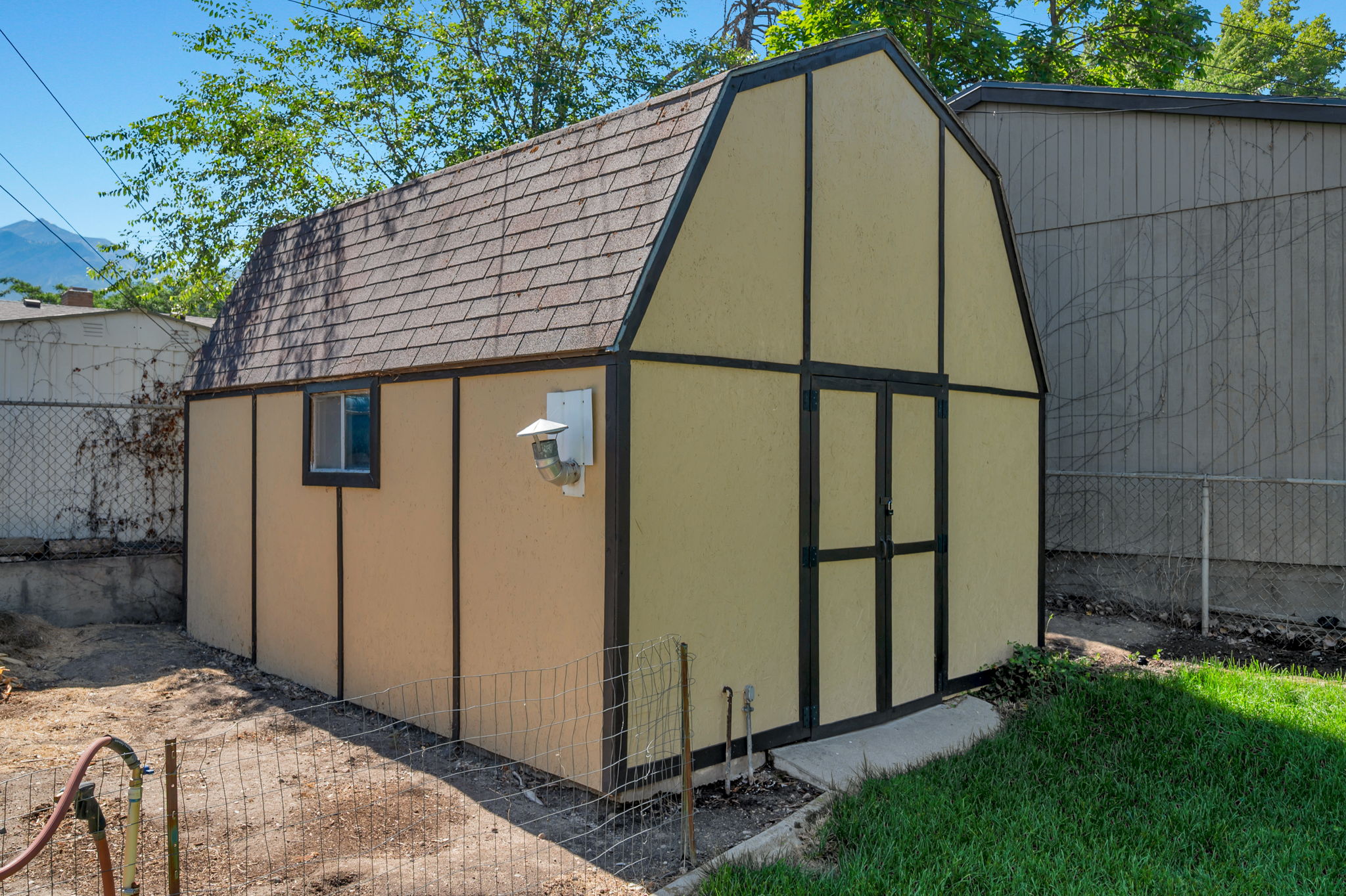 This is the coolest workshop! It's heated, with an air compressor,(included) and permanent lines to attach your tools to, window fan and added space in the loft for storage