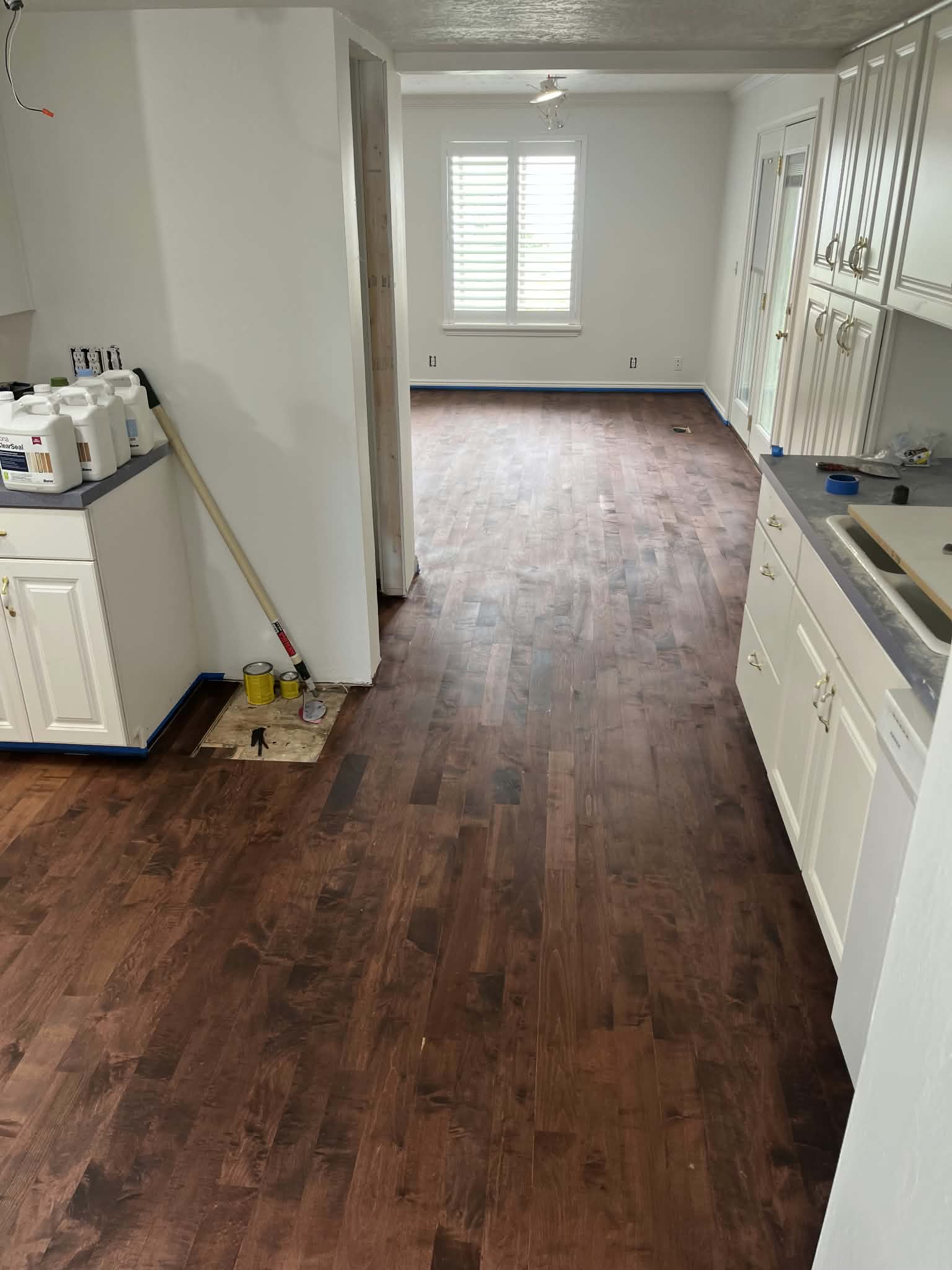 Spacious interior featuring rich wood-finish flooring throughout