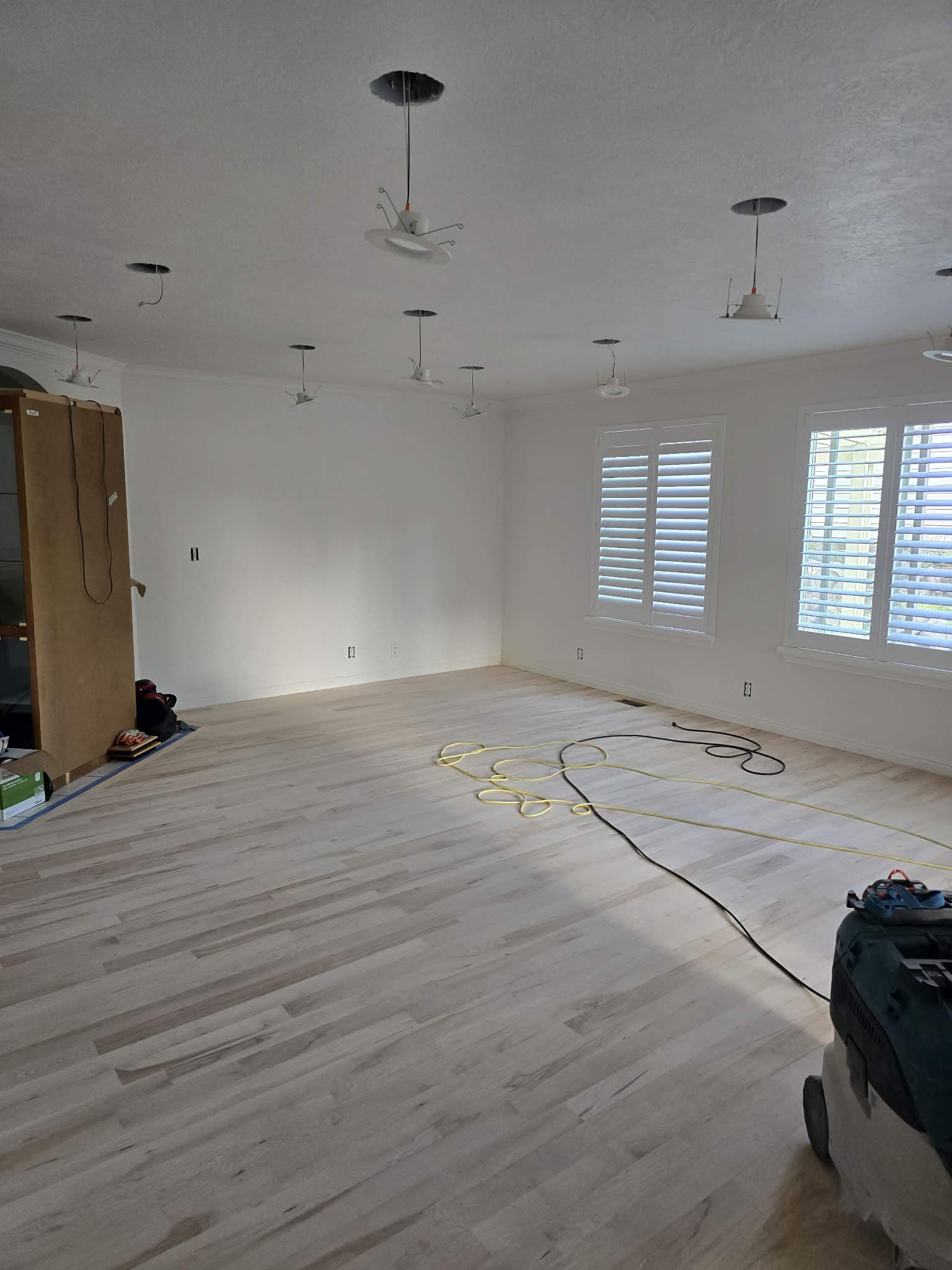 Light wood-finish flooring offering a bright, neutral aesthetic