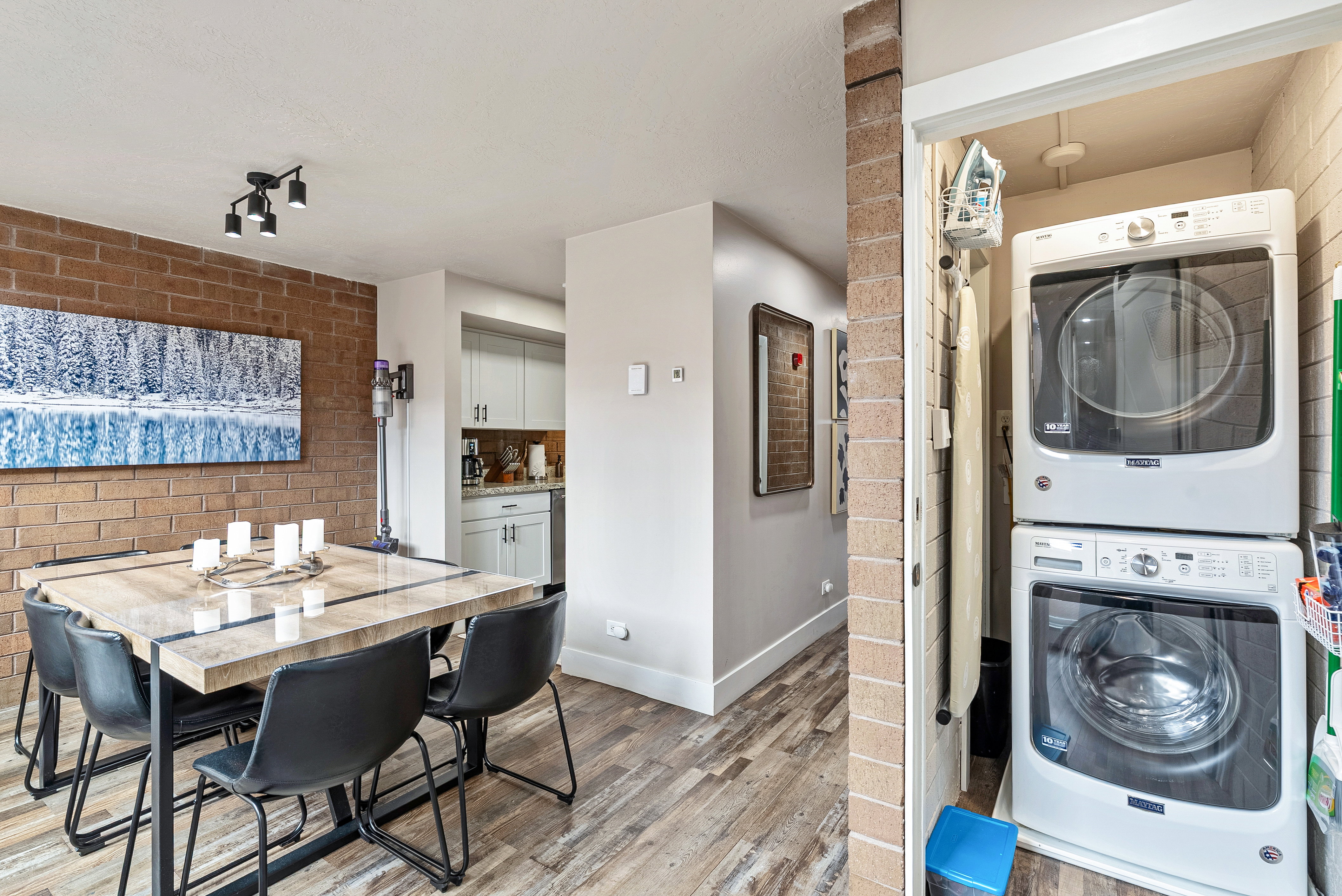 Dedicated laundry closet with stacked washer and dryer units