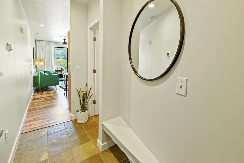 Condo entryway featuring slate flooring