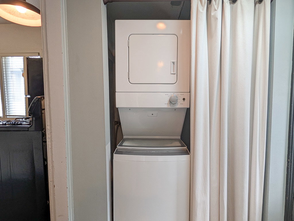 Stackable washer and dryer unit, featuring a white finish