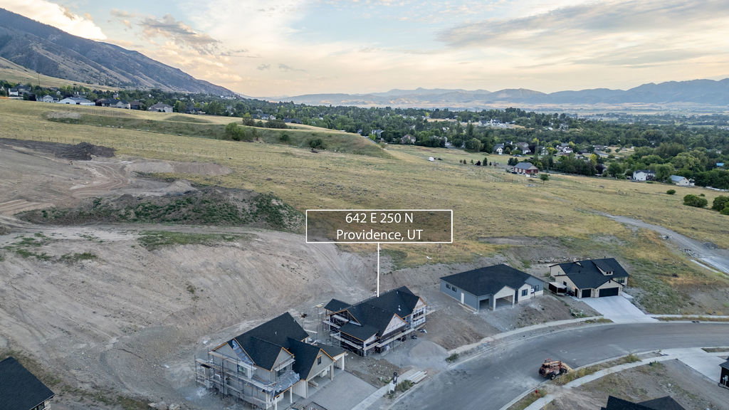 Newly constructed residence on a graded lot with a mountain backdrop