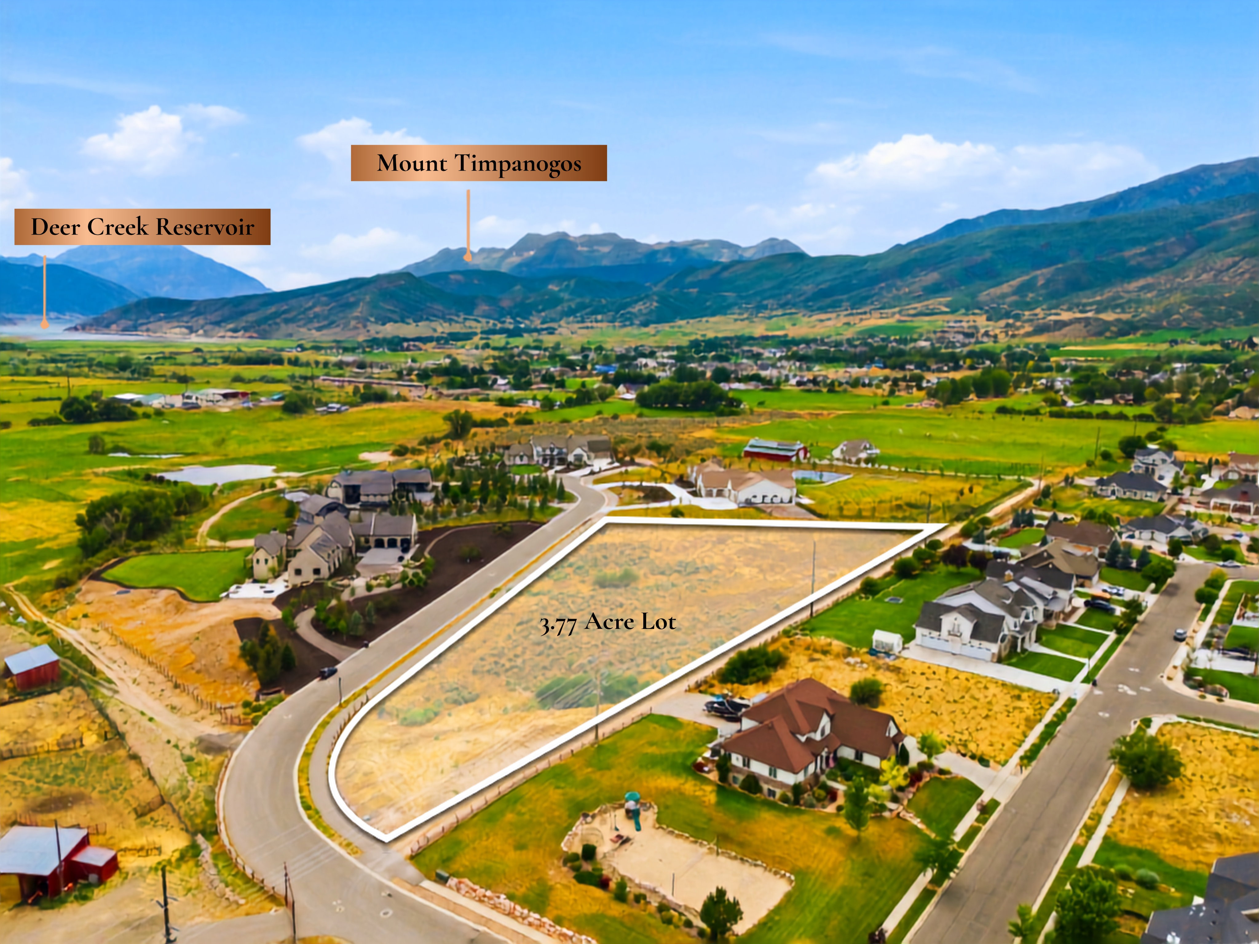 Expansive 3.77-acre lot with mountain backdrop and open terrain