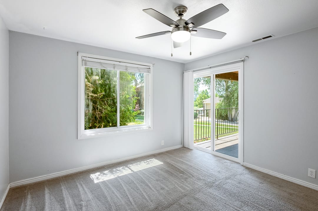 Light gray wall paint with white trim