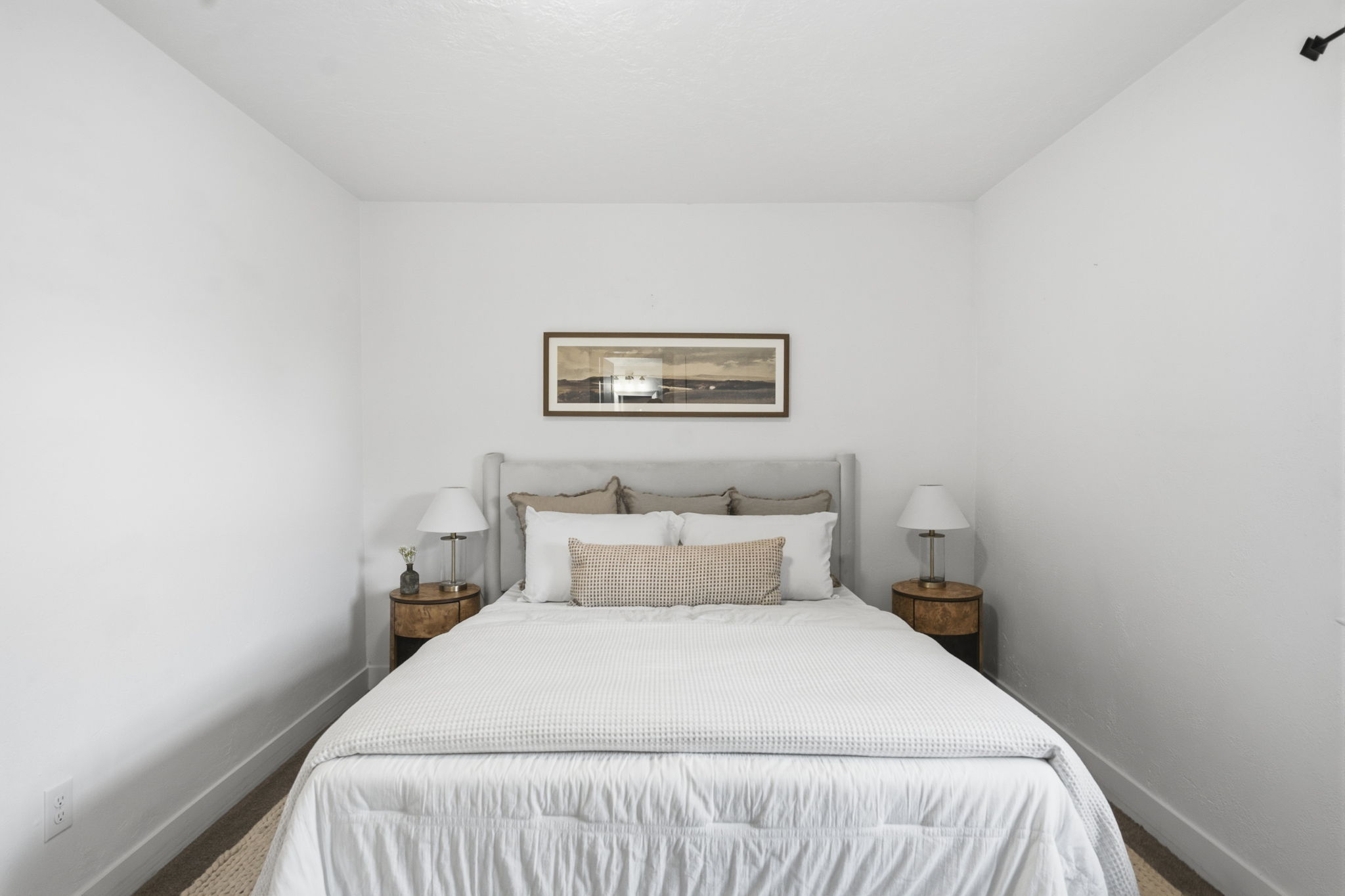 Bedroom featuring neutral wall colors, baseboard trim, and carpet flooring