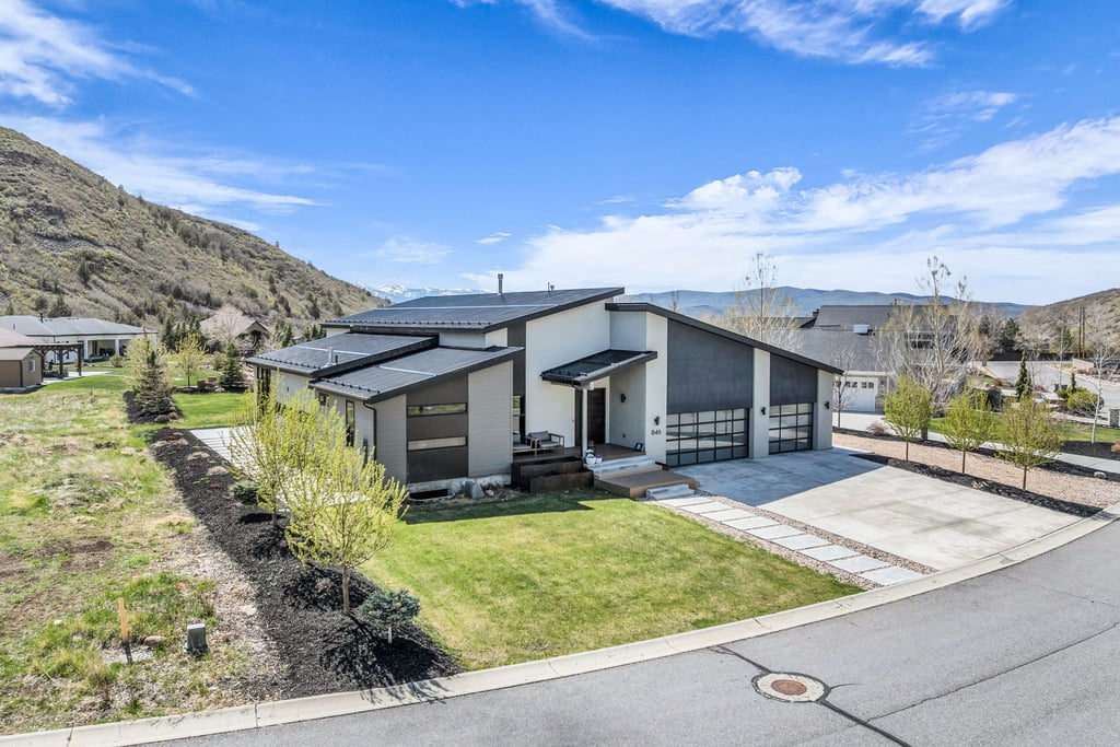 Modern architectural residence with a multi-pitch roofline