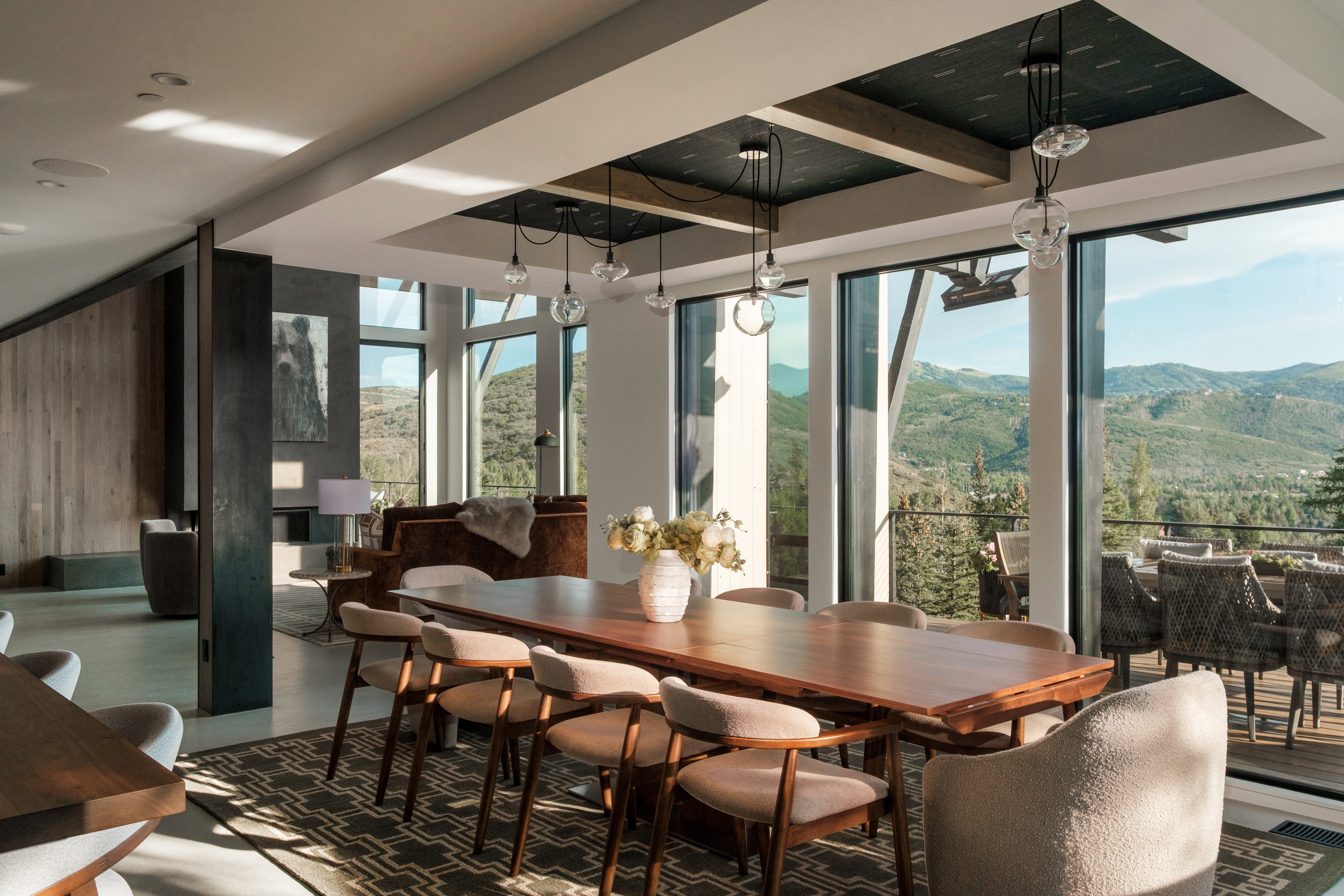 Spacious dining area featuring a wood-finish dining table and coordinated seating