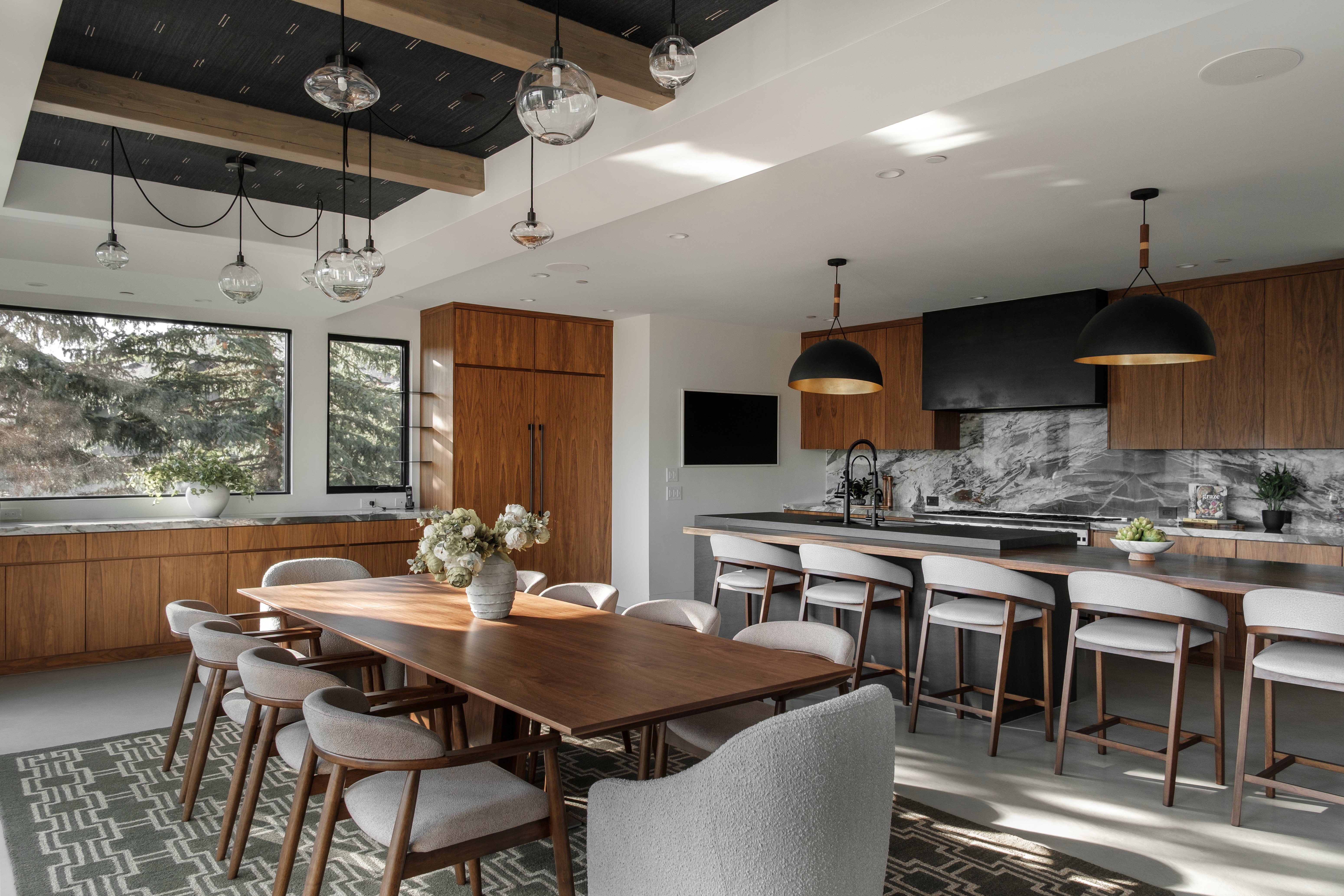 Open-concept living space featuring a dining area and kitchen