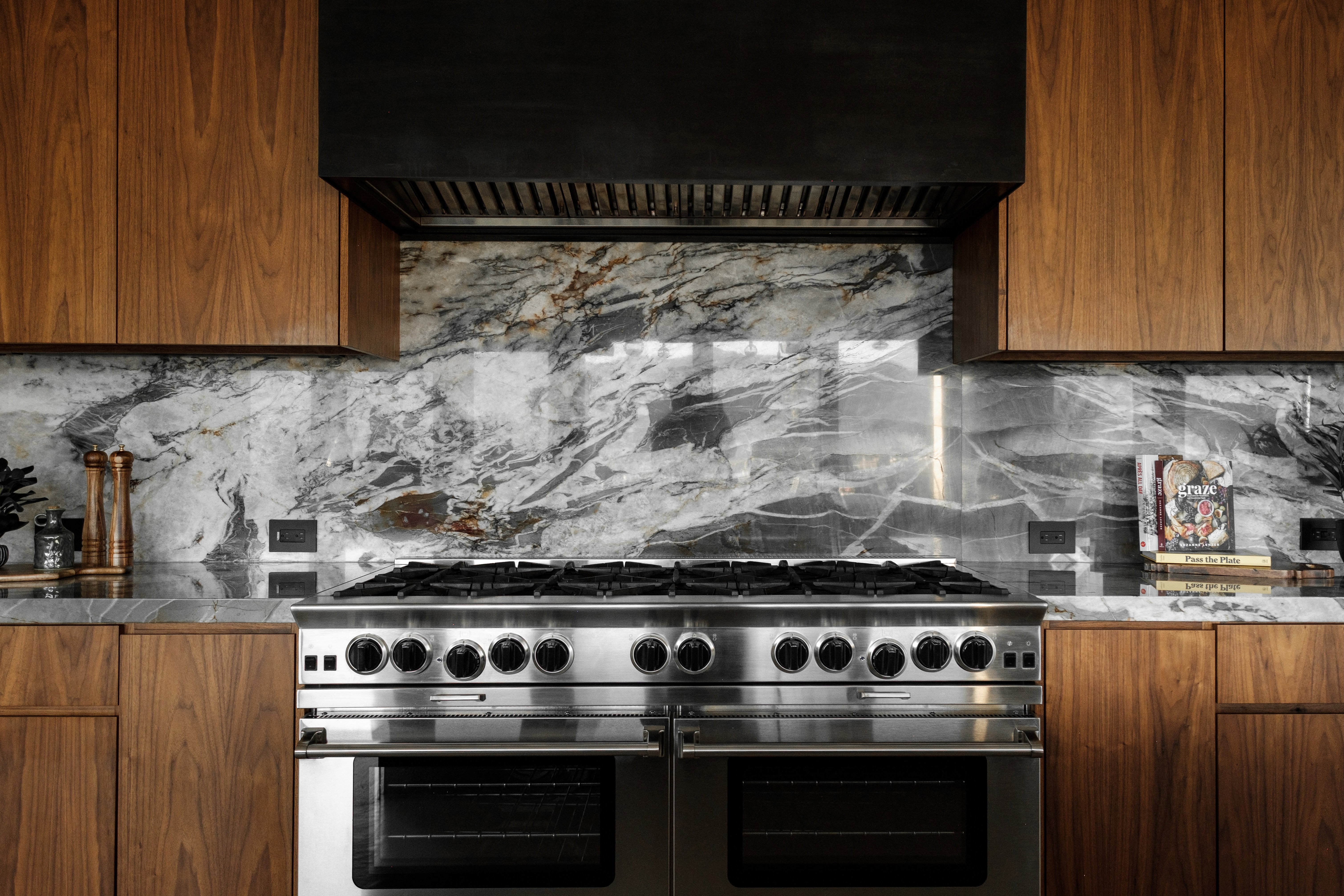 Stainless steel range with matching ventilation hood