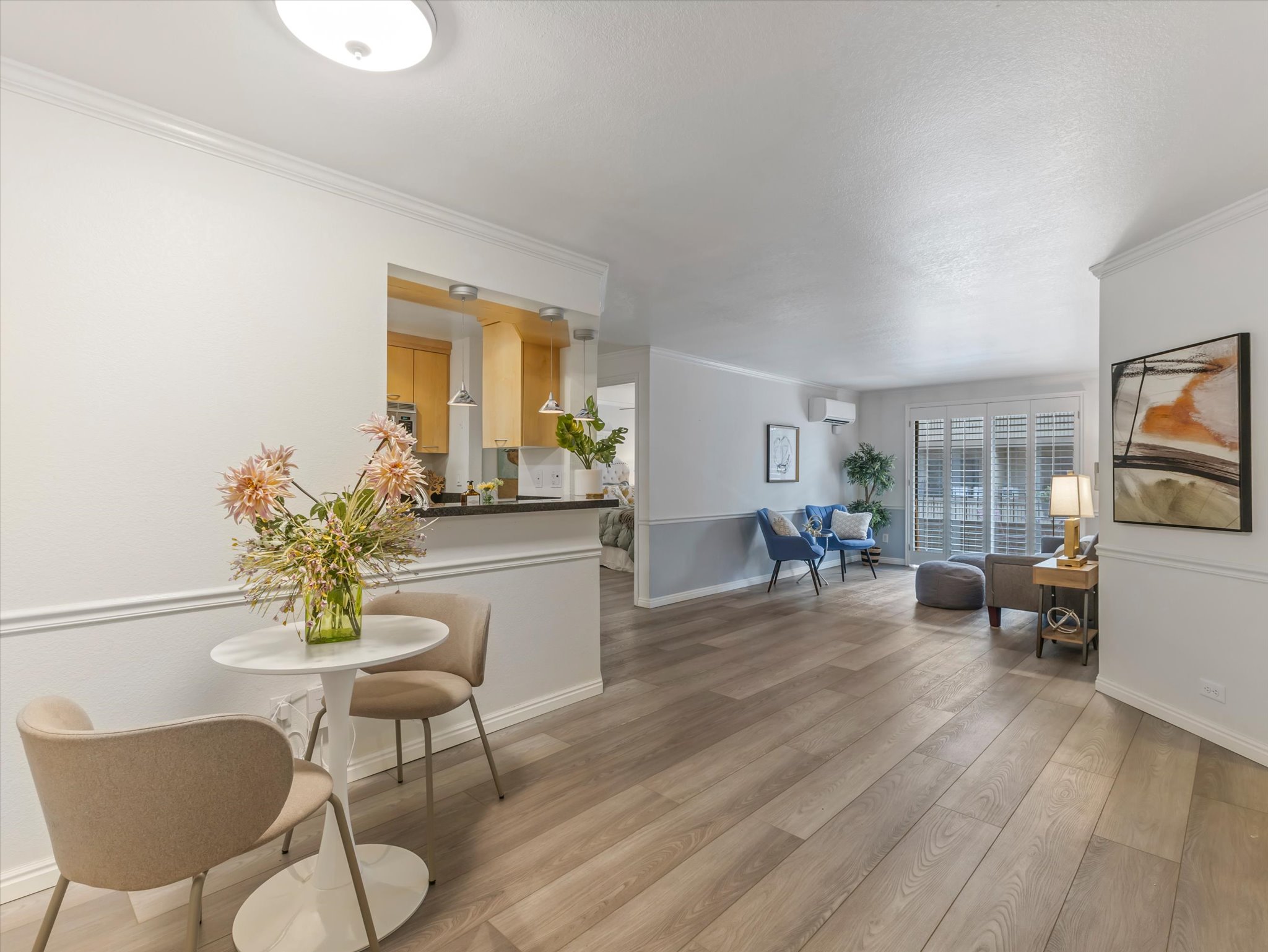 Spacious interior featuring wood-finish flooring throughout