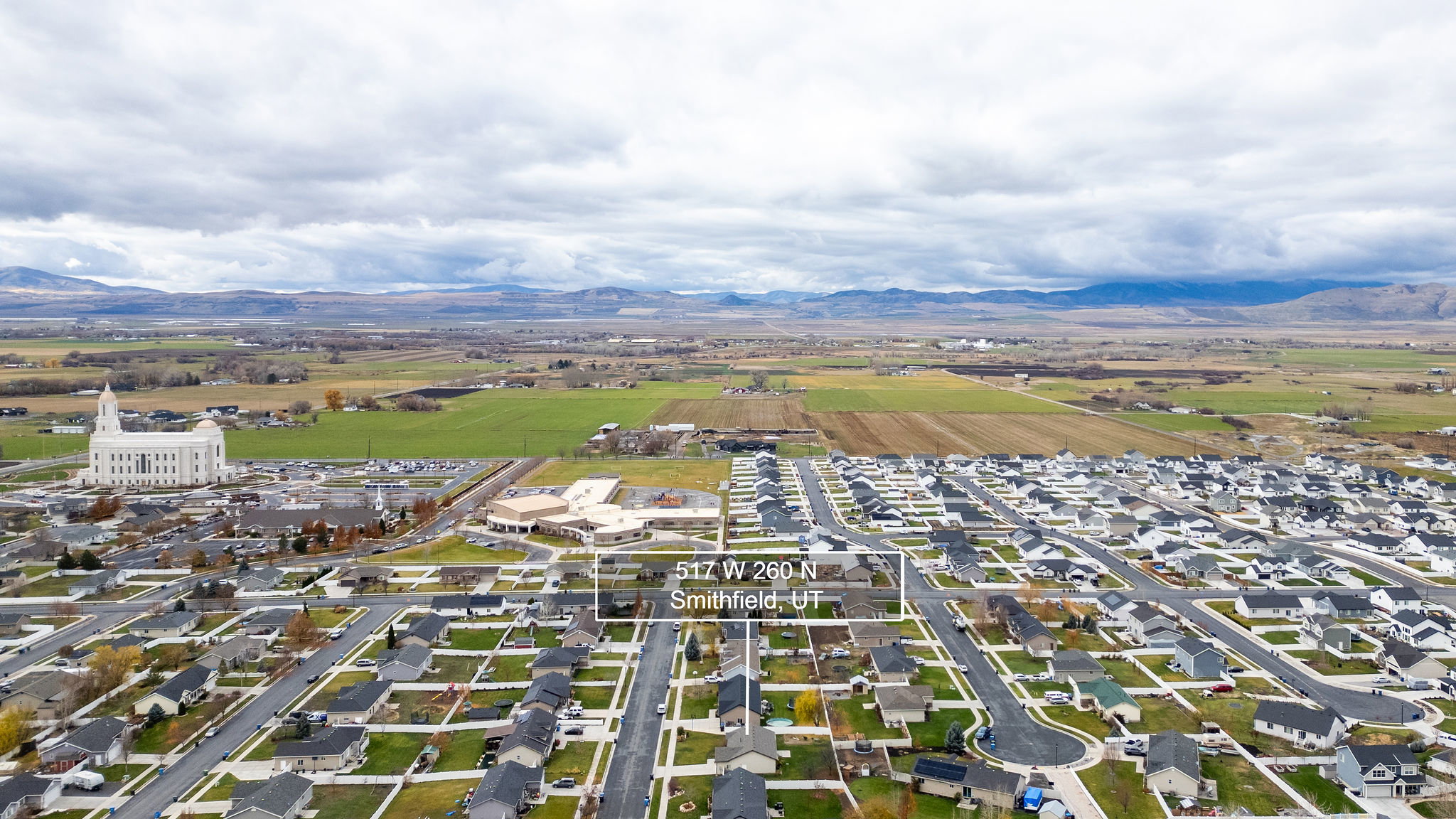 Aerial perspective of a developed residential area with numerous single-family homes