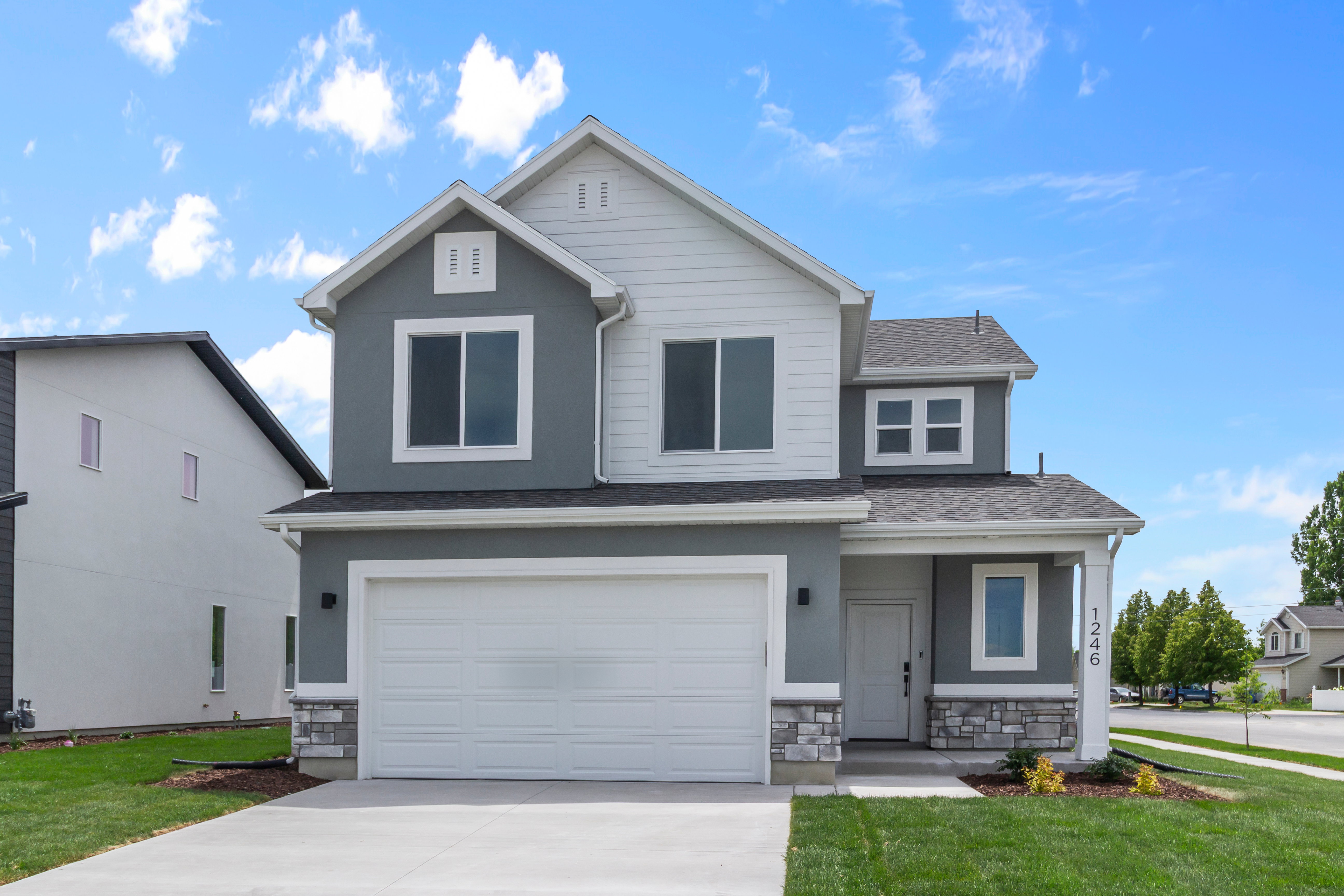 TRADITIONAL ELEVATION - VINYL SIDING IN PLACE OF STUCCO