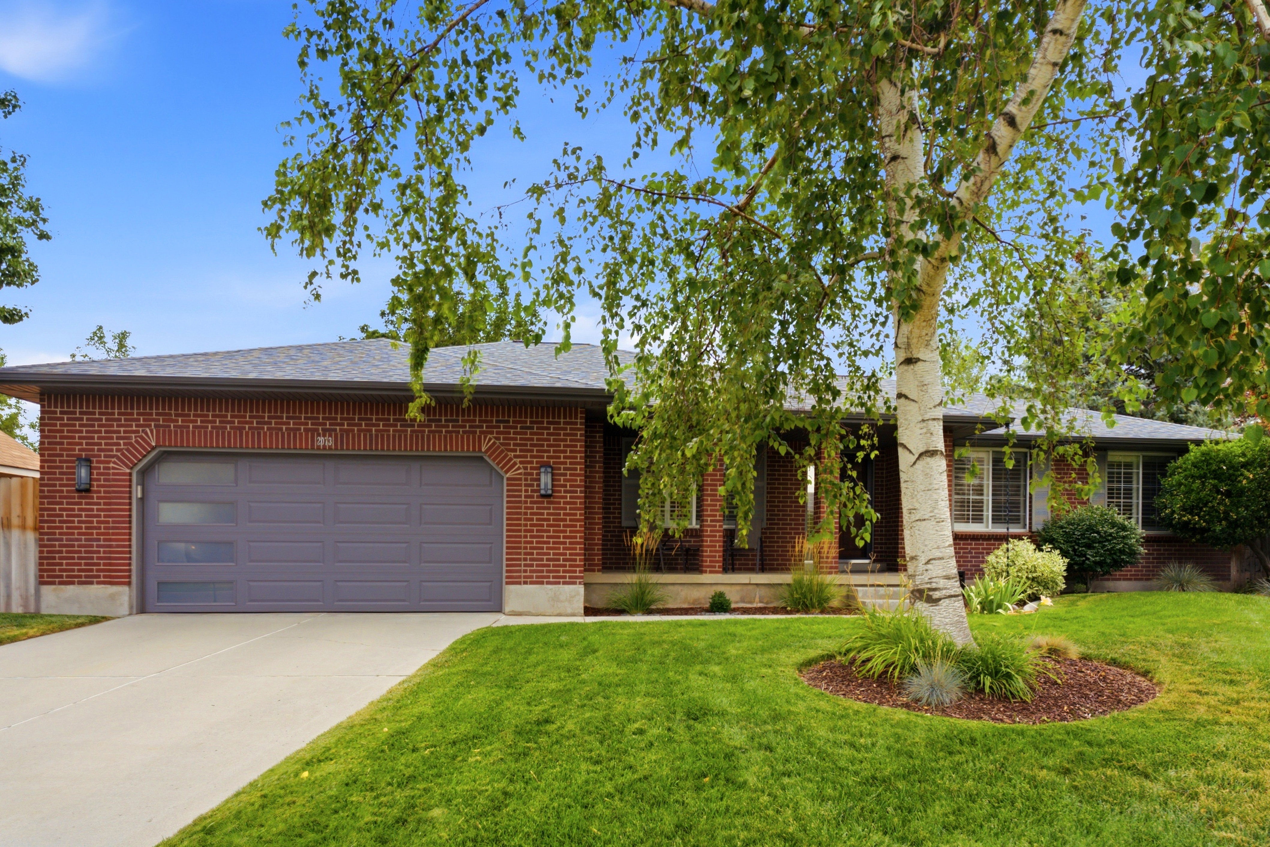 Brick exterior  featuring frosted glass panels.