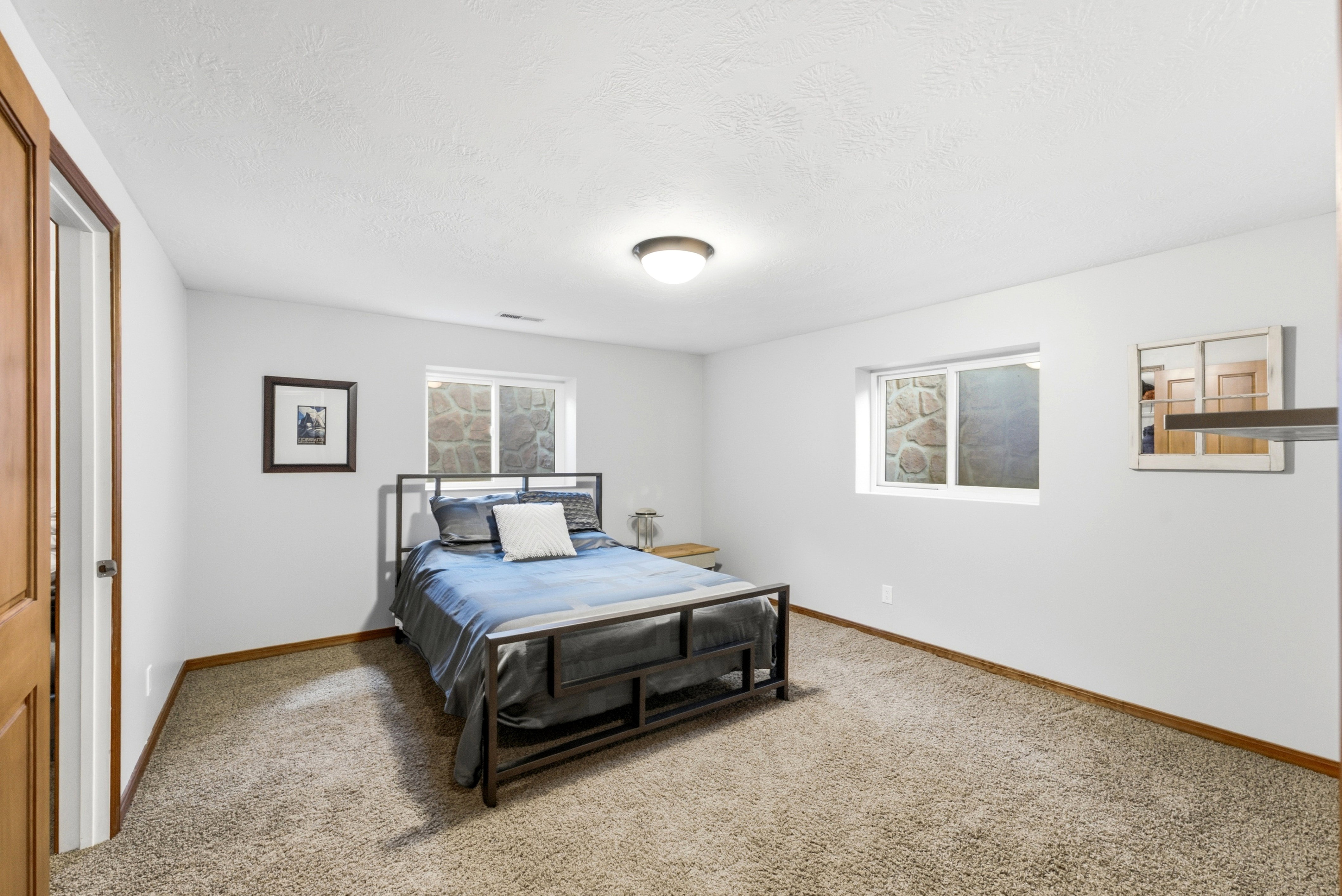 Large bedroom with large walk in closet.