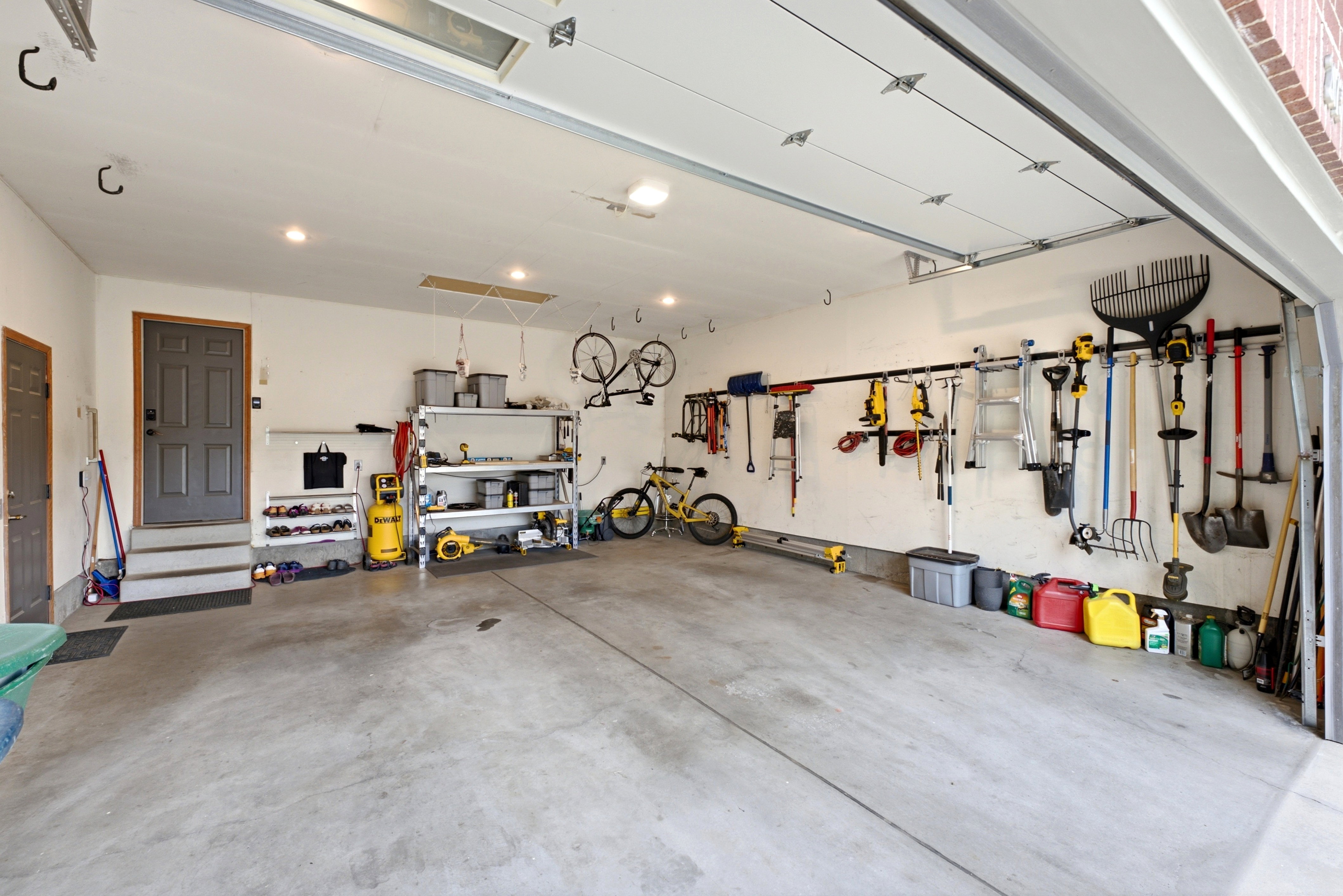 Spacious garage with lots of storage.