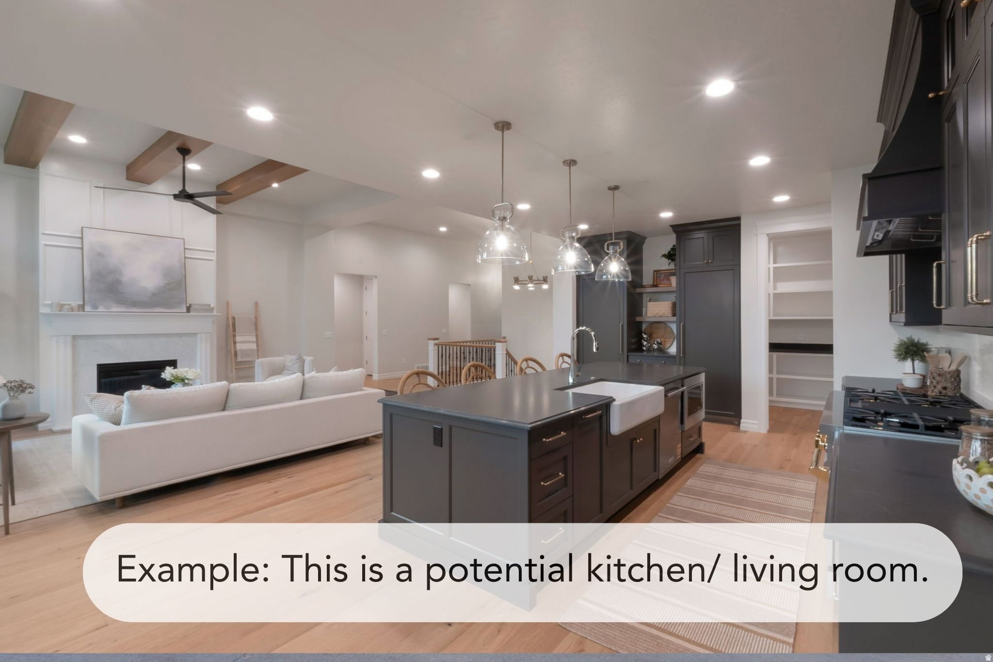Open-concept living space with wood-finish flooring