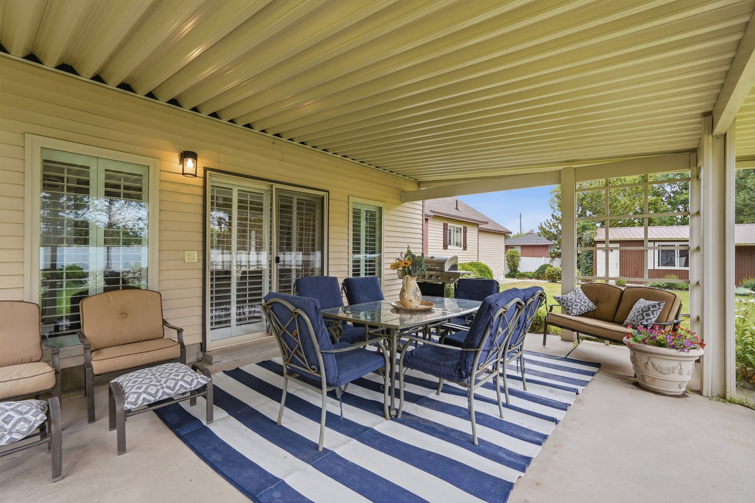 Covered patio with a corrugated metal ceiling