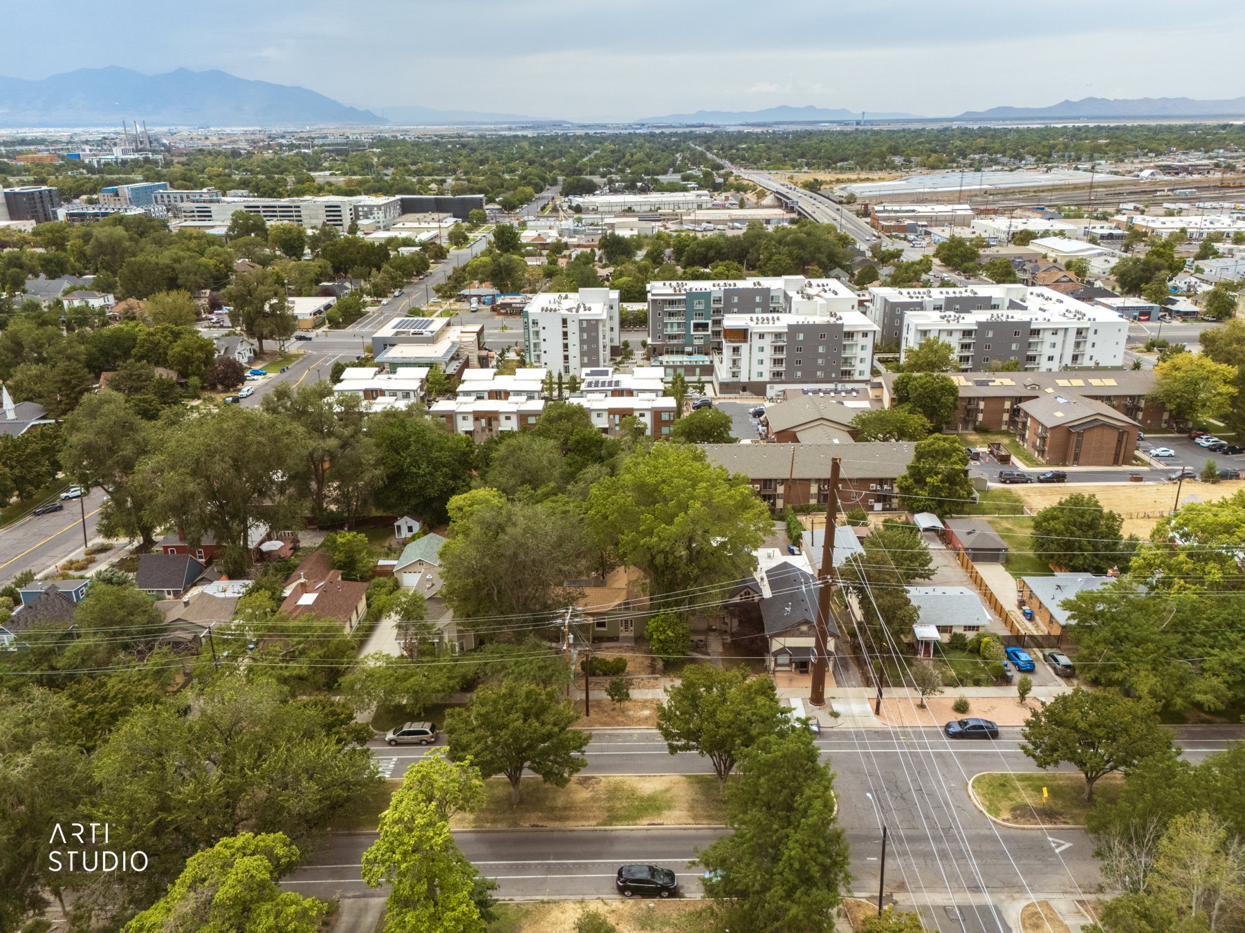 Aerial perspective showcasing a diverse urban landscape with residential and multi-story structures