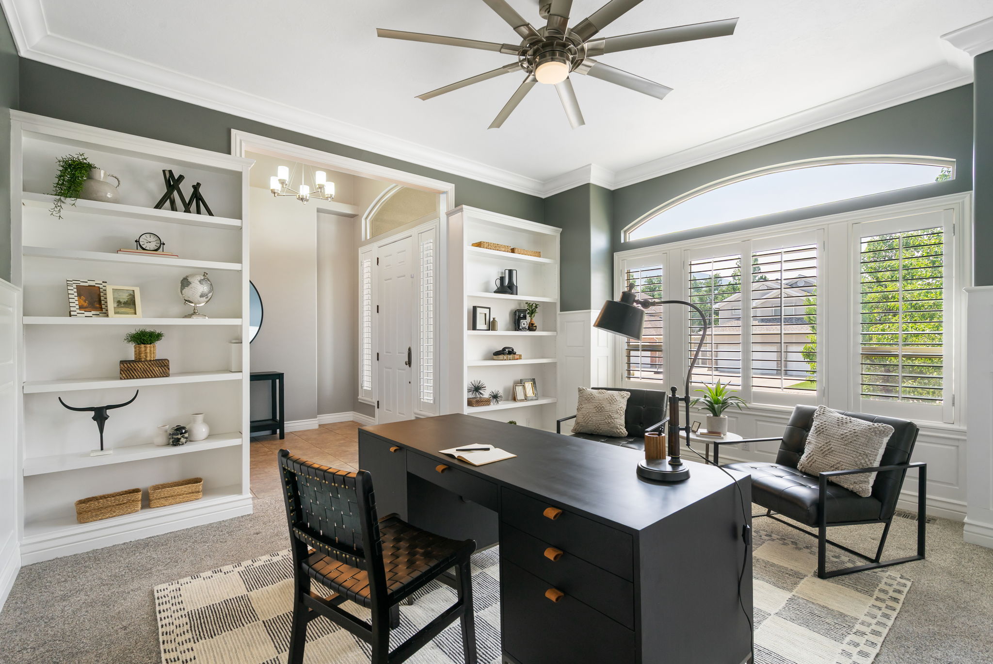 Office is just inside front entry allowing convenient client access with built-in shelving
