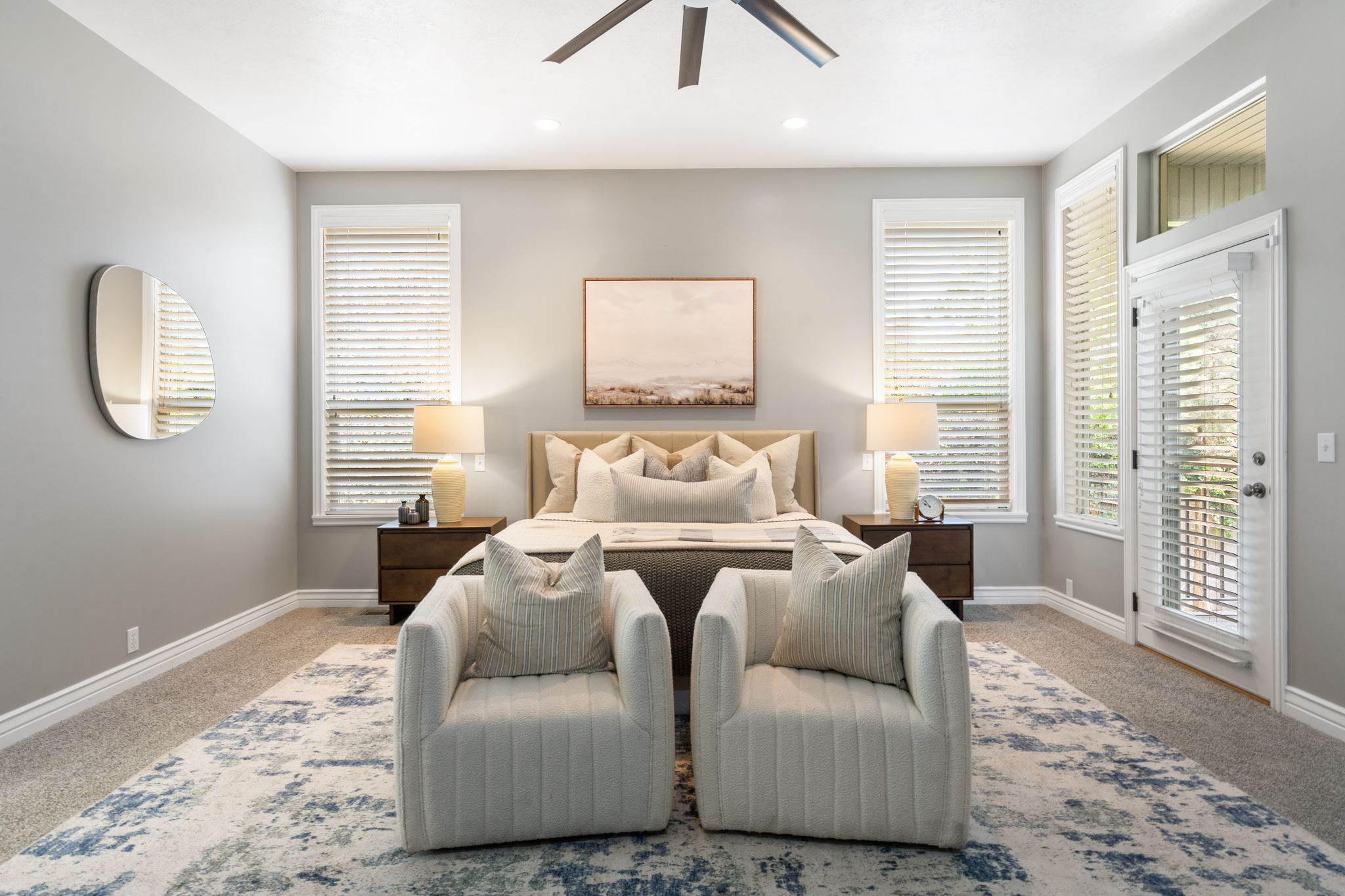 Main level, primary suite with direct deck access.