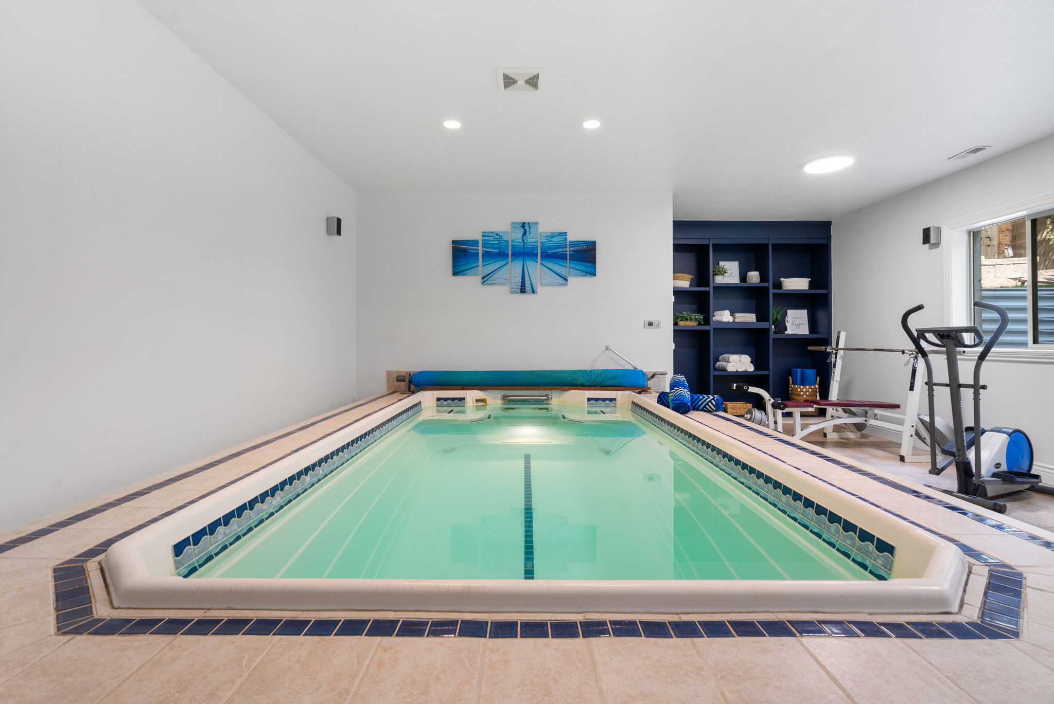 Train like a champion in your private, dedicated wellness studio. The heated indoor swim spa offers year-round training, hydrotherapy, and relaxation.