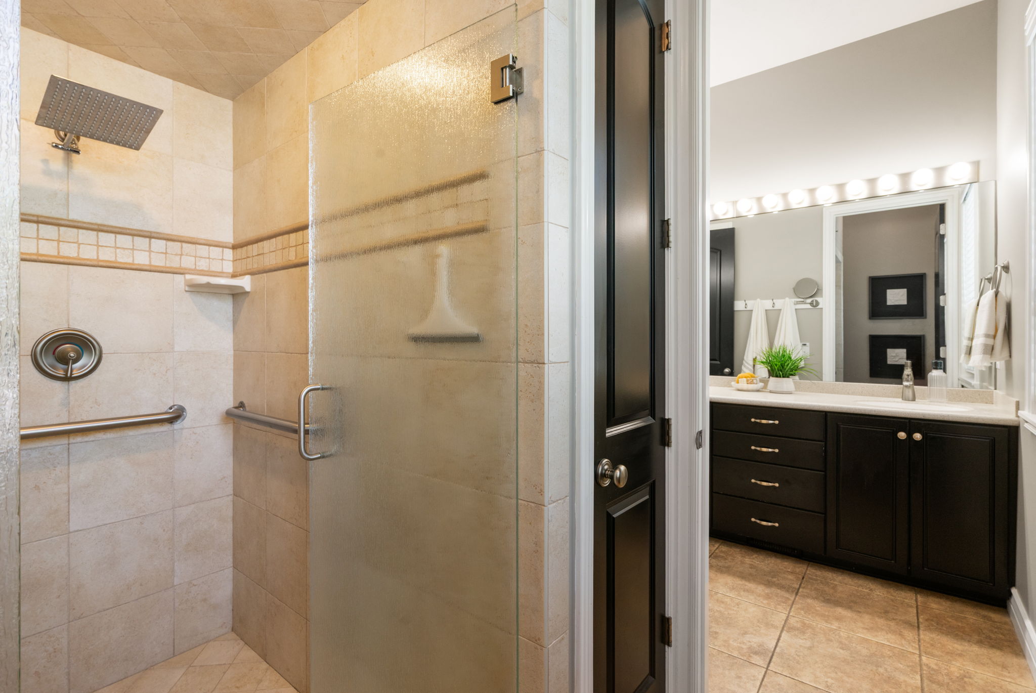 Primary ensuite has separate shower/ toilet room with its own storage closet. Allows space to get ready for the day.