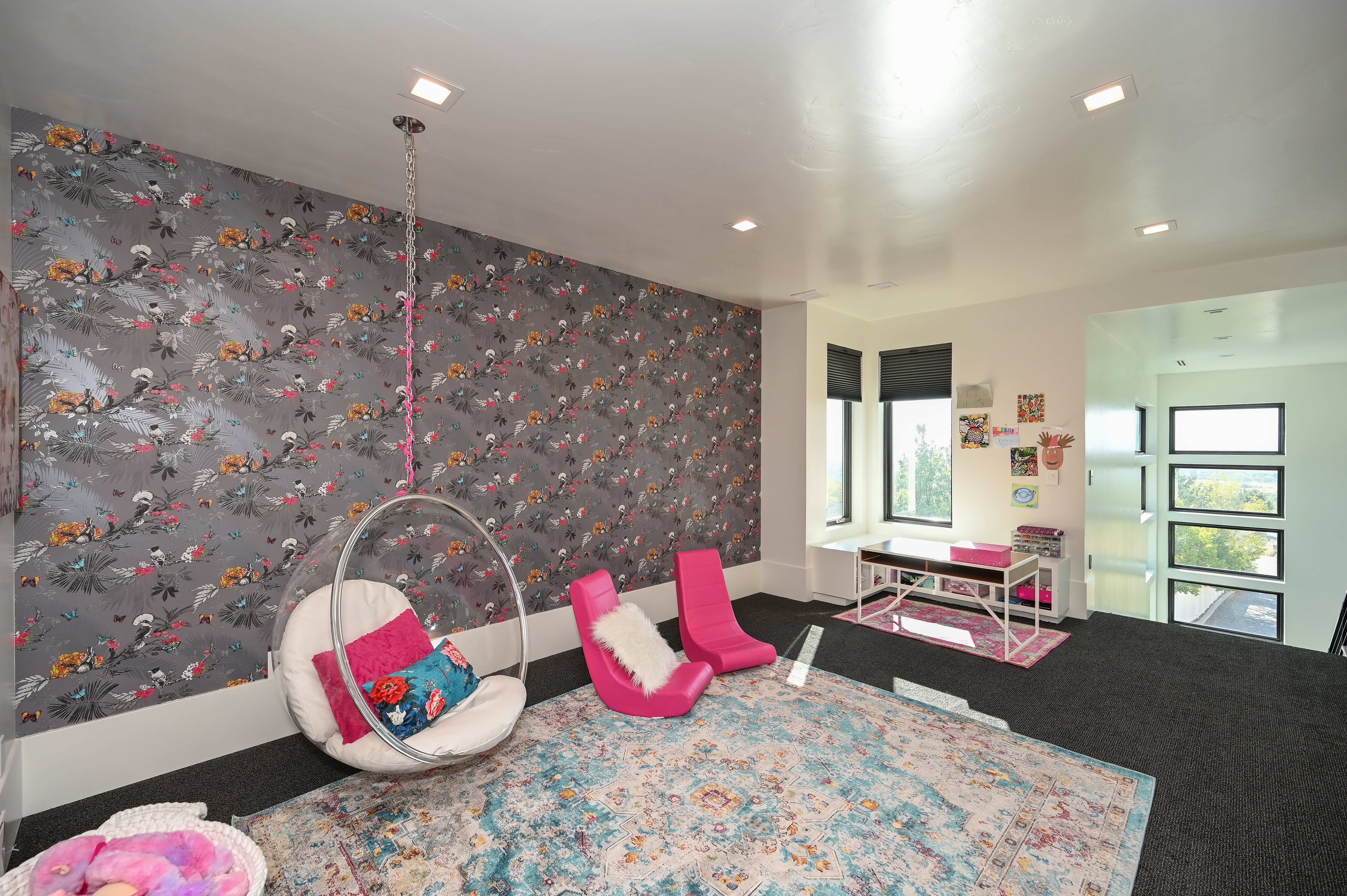 Accent wall featuring patterned wallpaper