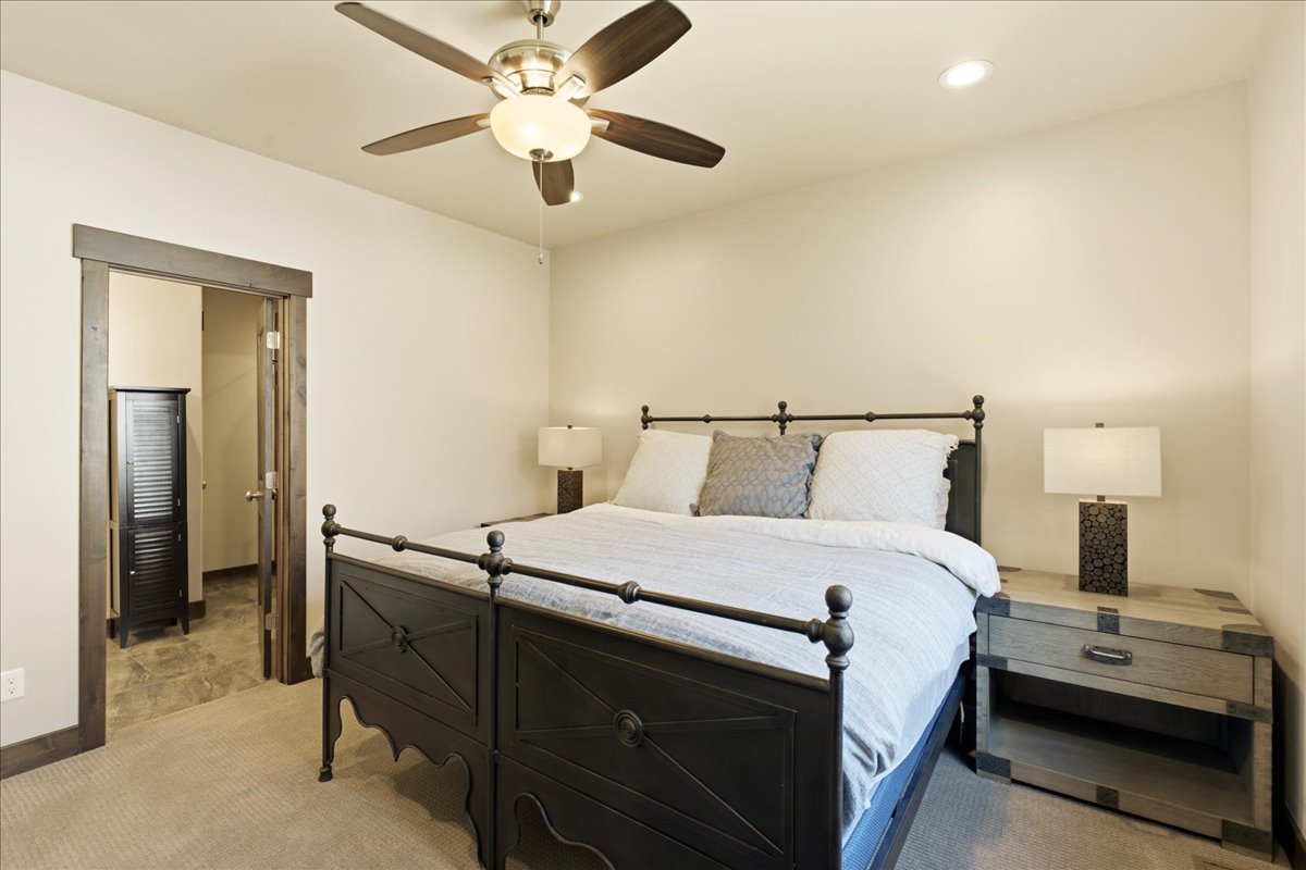 Bedroom featuring carpet flooring, recessed lighting, and a ceiling fan with light fixture