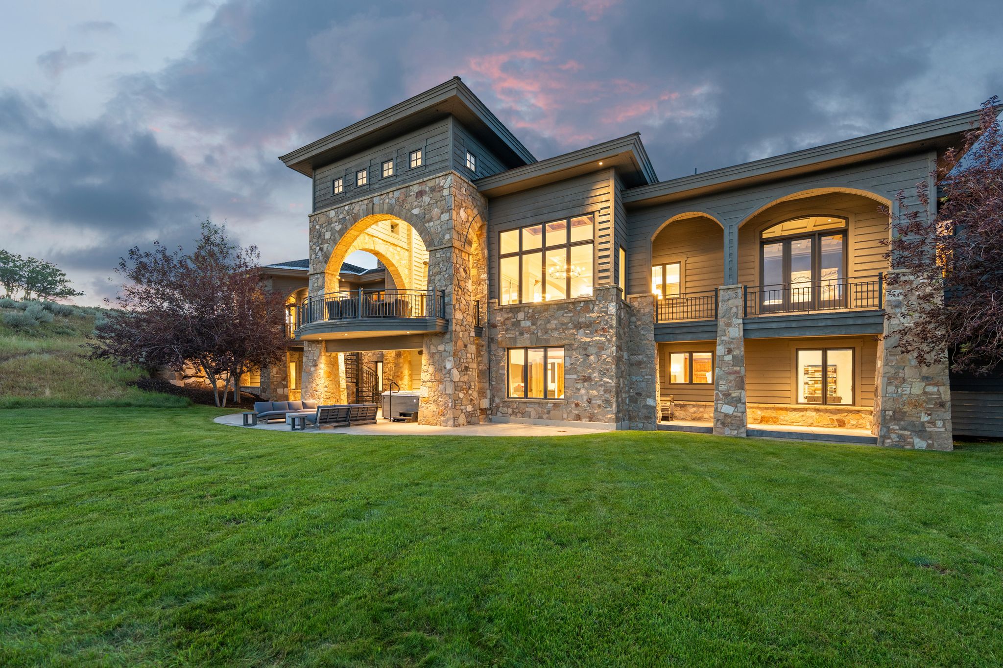 Stone and siding exterior with expansive windows