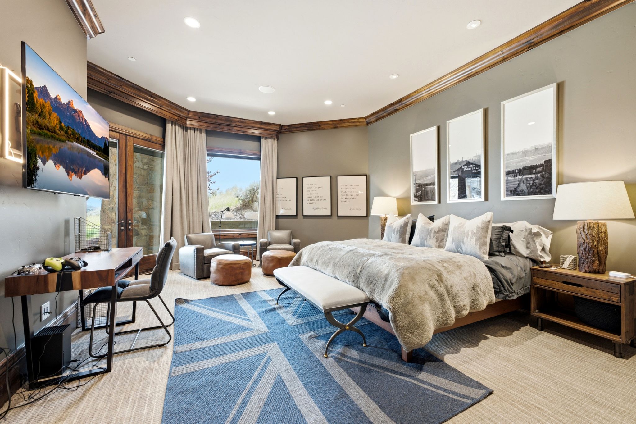 Spacious sleeping quarters featuring wood-finish crown molding, recessed lighting, and wall-to-wall carpeting