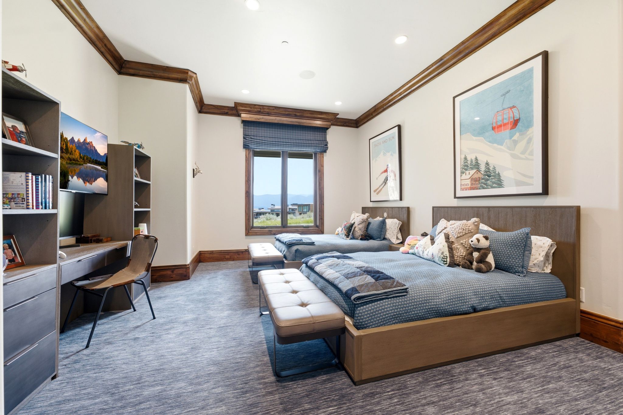 Bedroom featuring wood-trim accents, recessed lighting, and a built-in desk with shelving