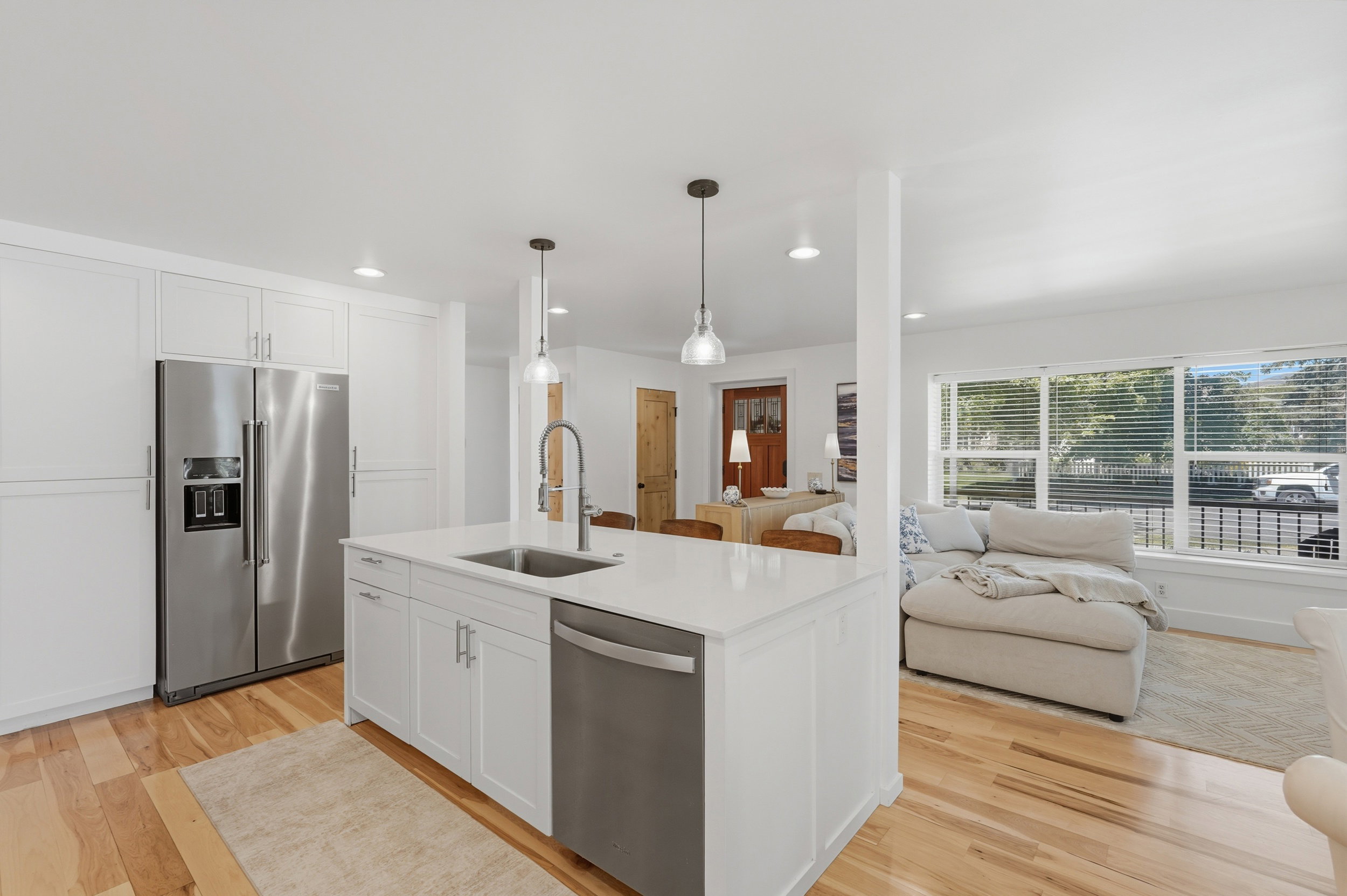 Modern kitchen island with quartz countertop and undermount sink