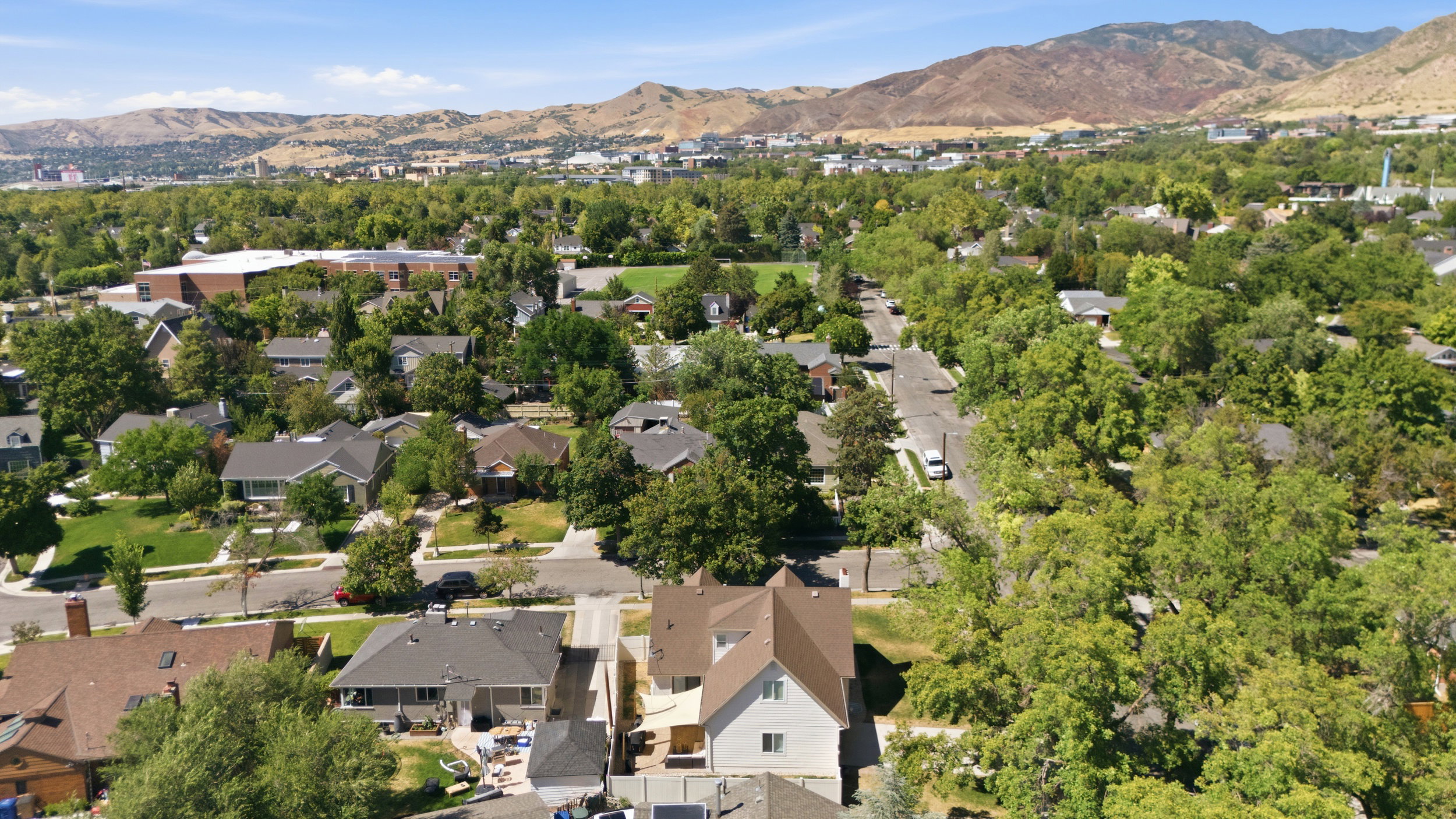Aerial perspective showcasing a residential area with varied housing styles