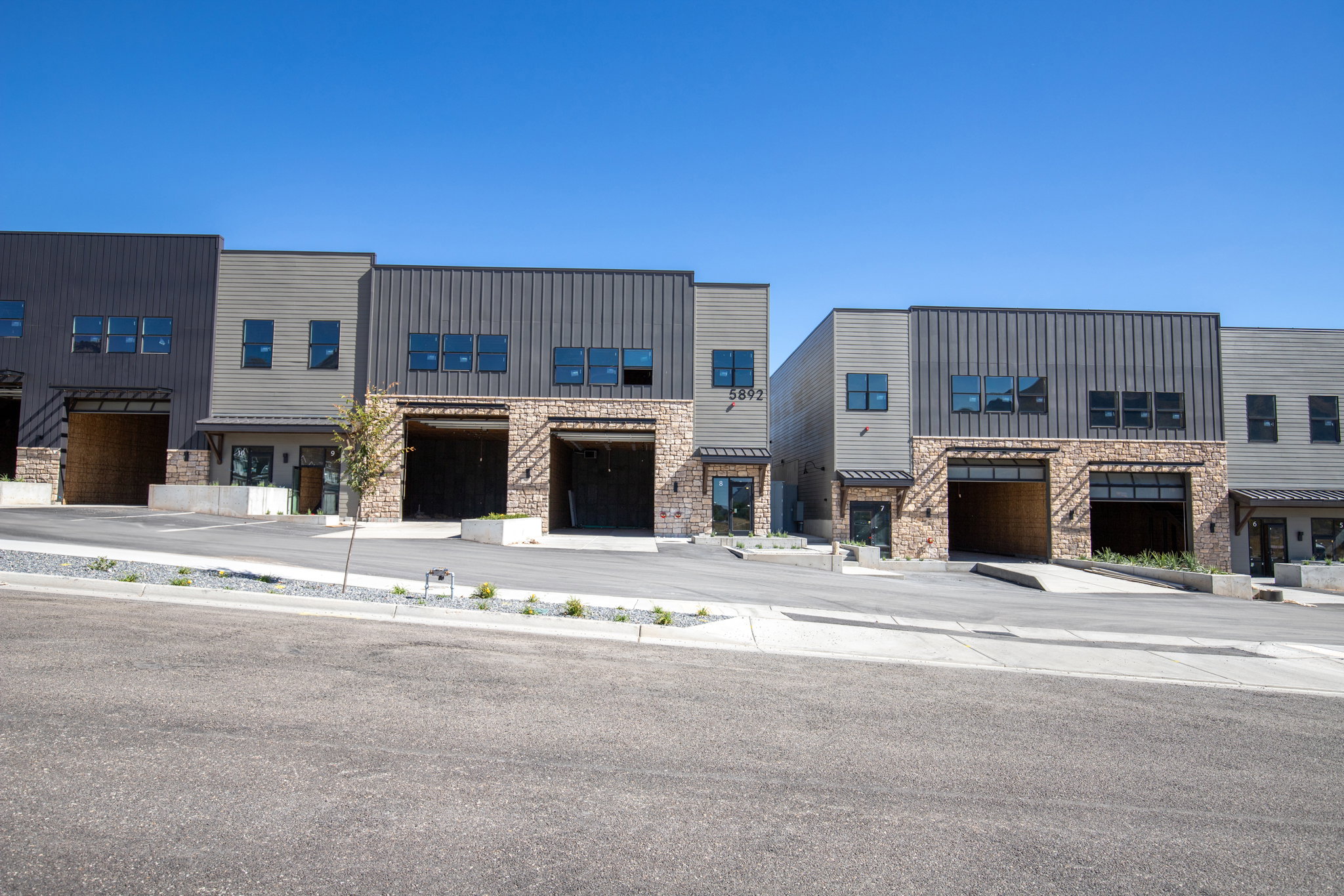 Modern commercial-style exterior with vertical siding
